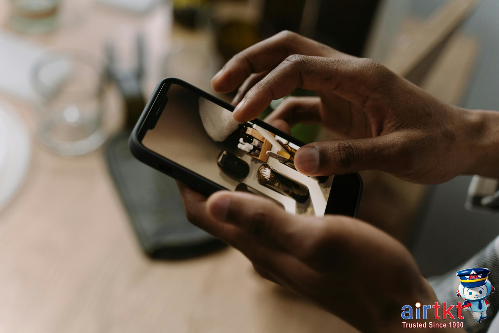 Guest earning World of Hyatt points via mobile app on smartphone.