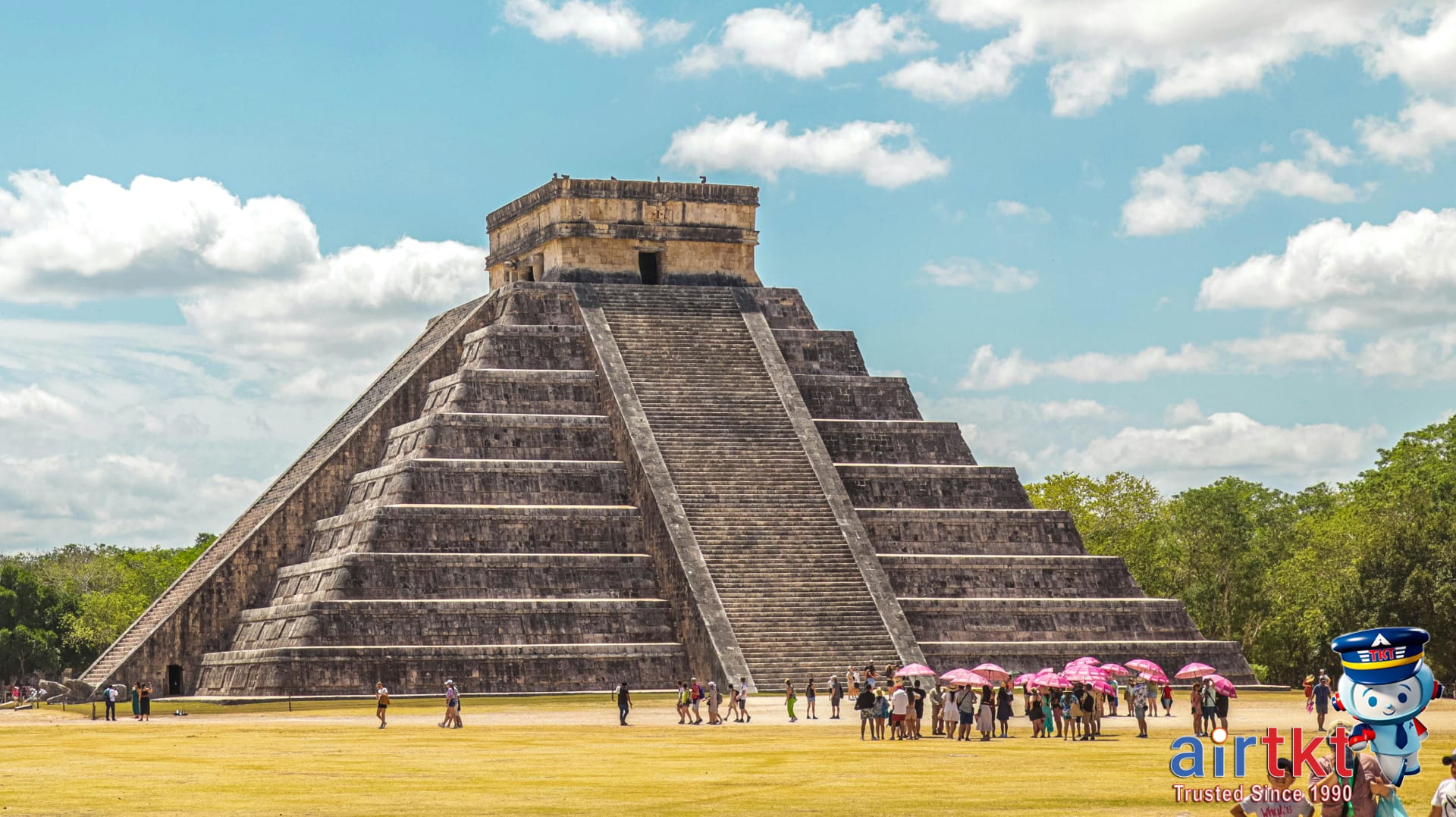 Respectful travelers visiting Latin America cultural landmarks including iconic ancient pyramid