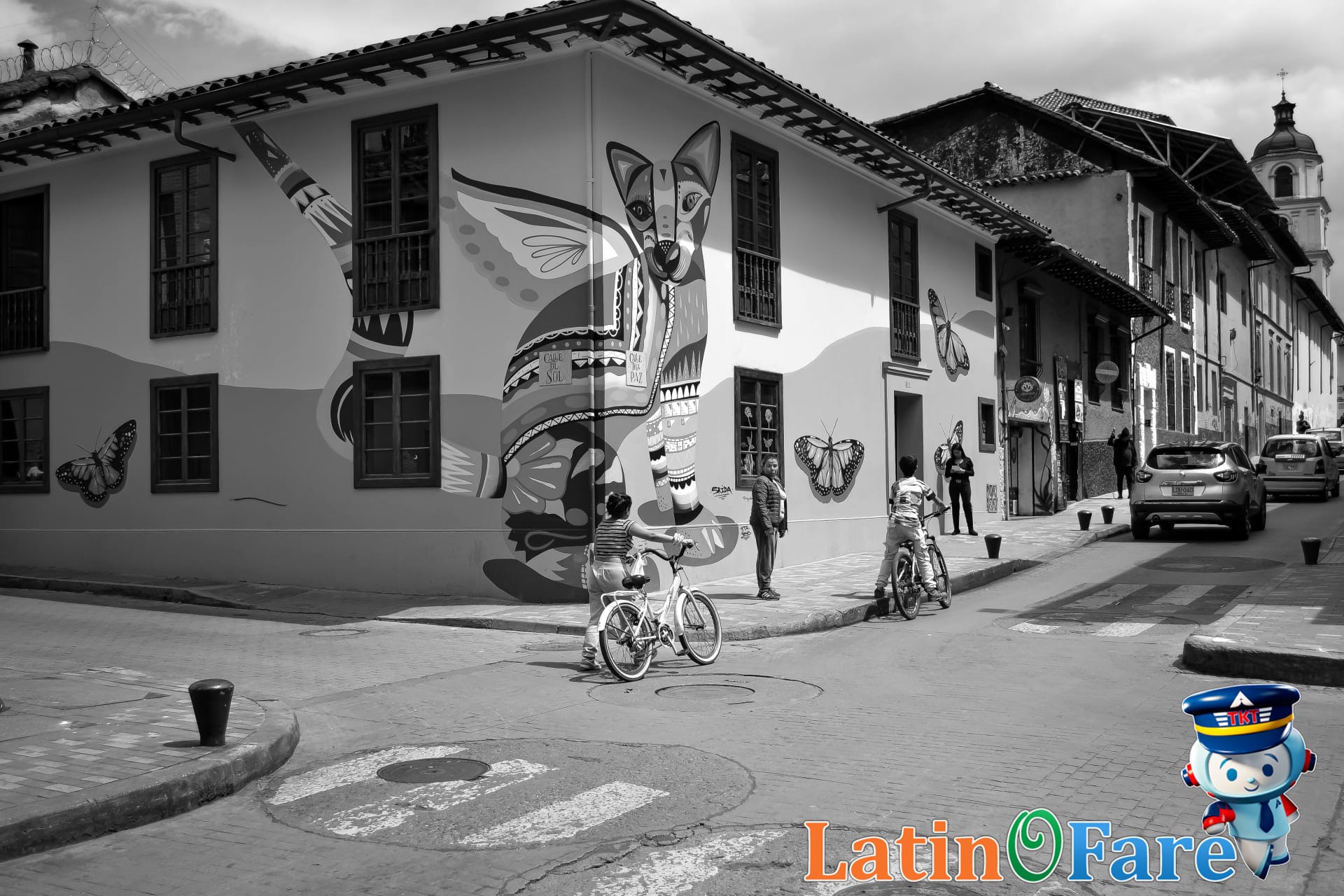 Street art wall bursting with color in La Candelaria on a Bogotá mural walking tour.