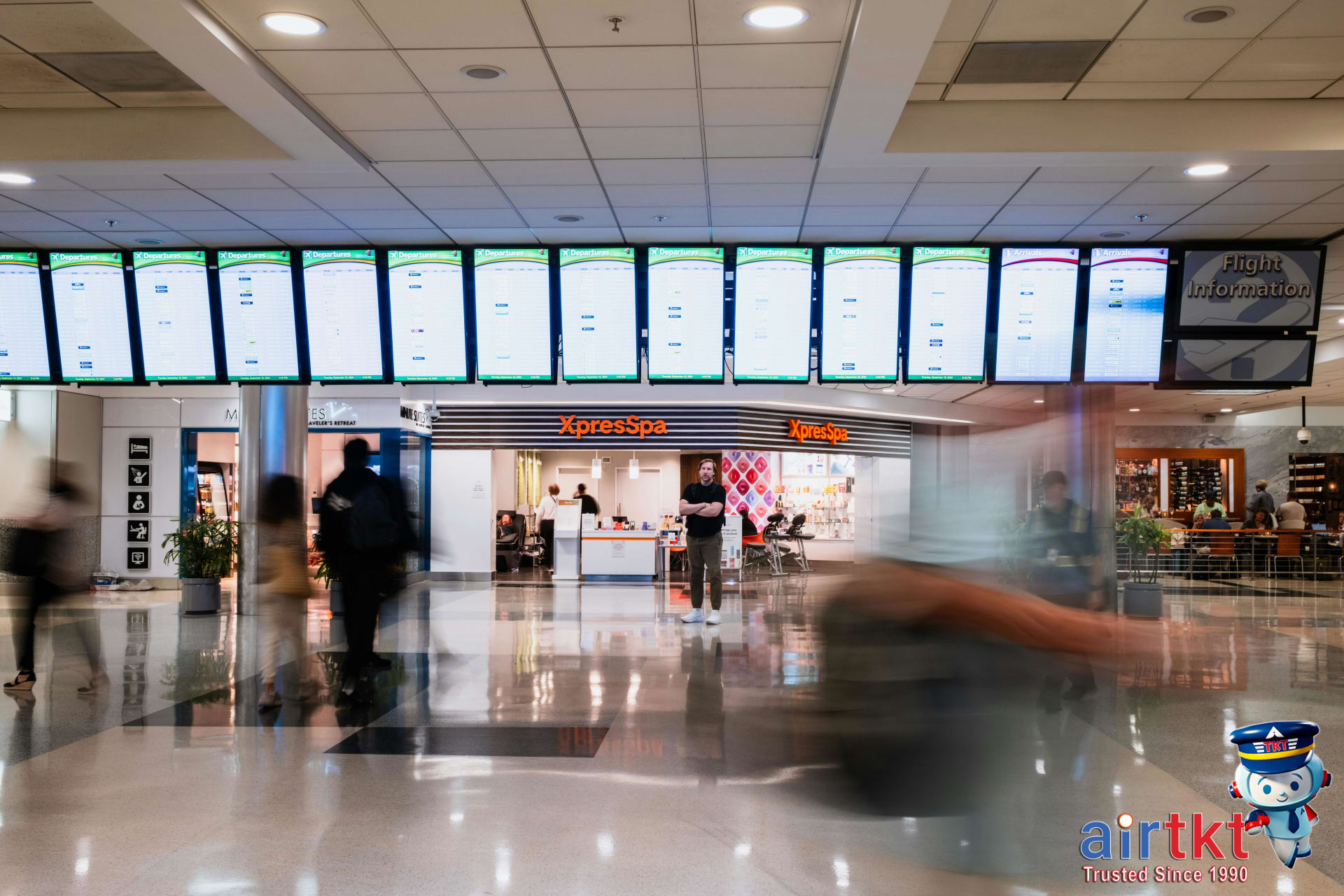 Busy US airport terminal with multiple flights to Latin America