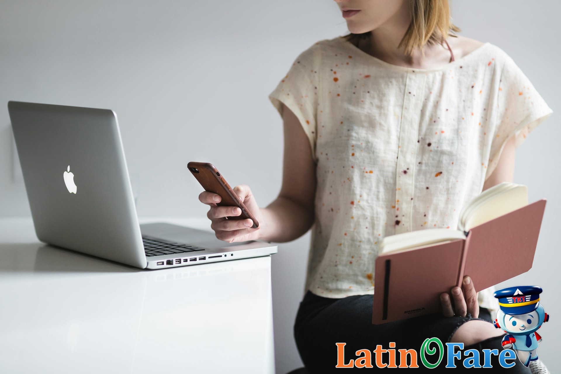 Online airfare search for cheap Fourth of July travel deals using booking platform and phone.