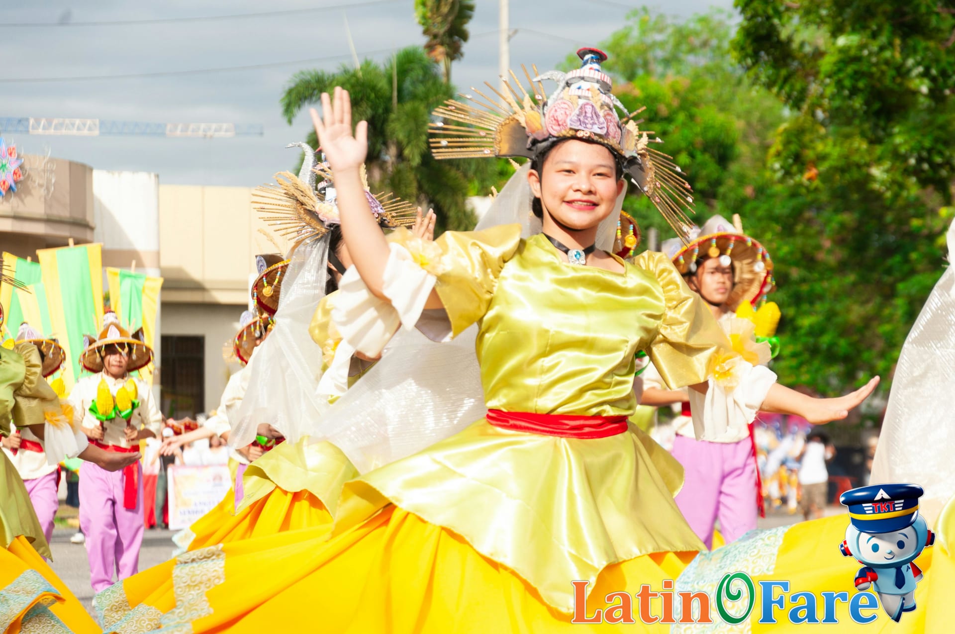 Independence Day parade in Manila with traditional dancers and Philippine costumes.