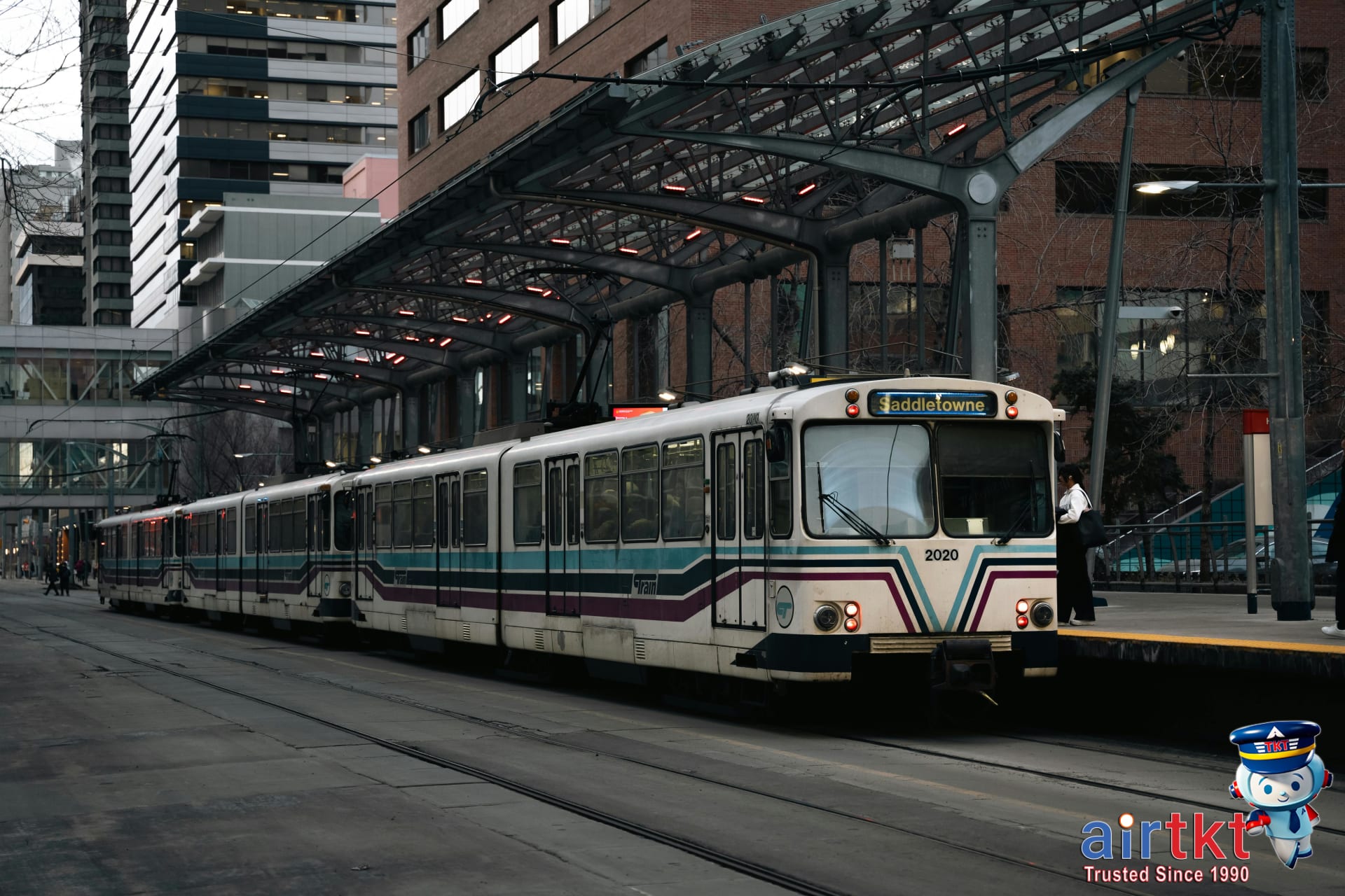 Charlotte Lynx light rail public transit system passing through uptown on a sunny day