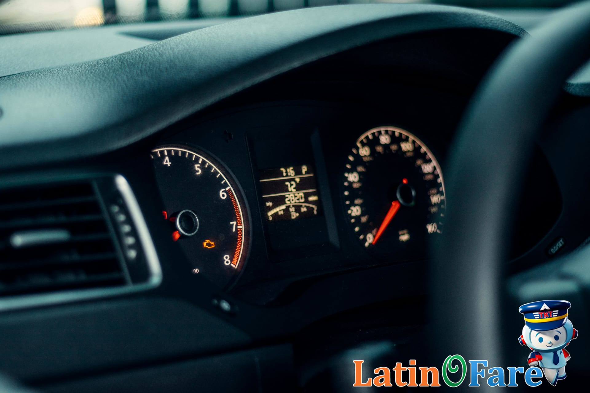 Illuminated car dashboard showing car gauges, symbolizing earning and using Hertz loyalty points.