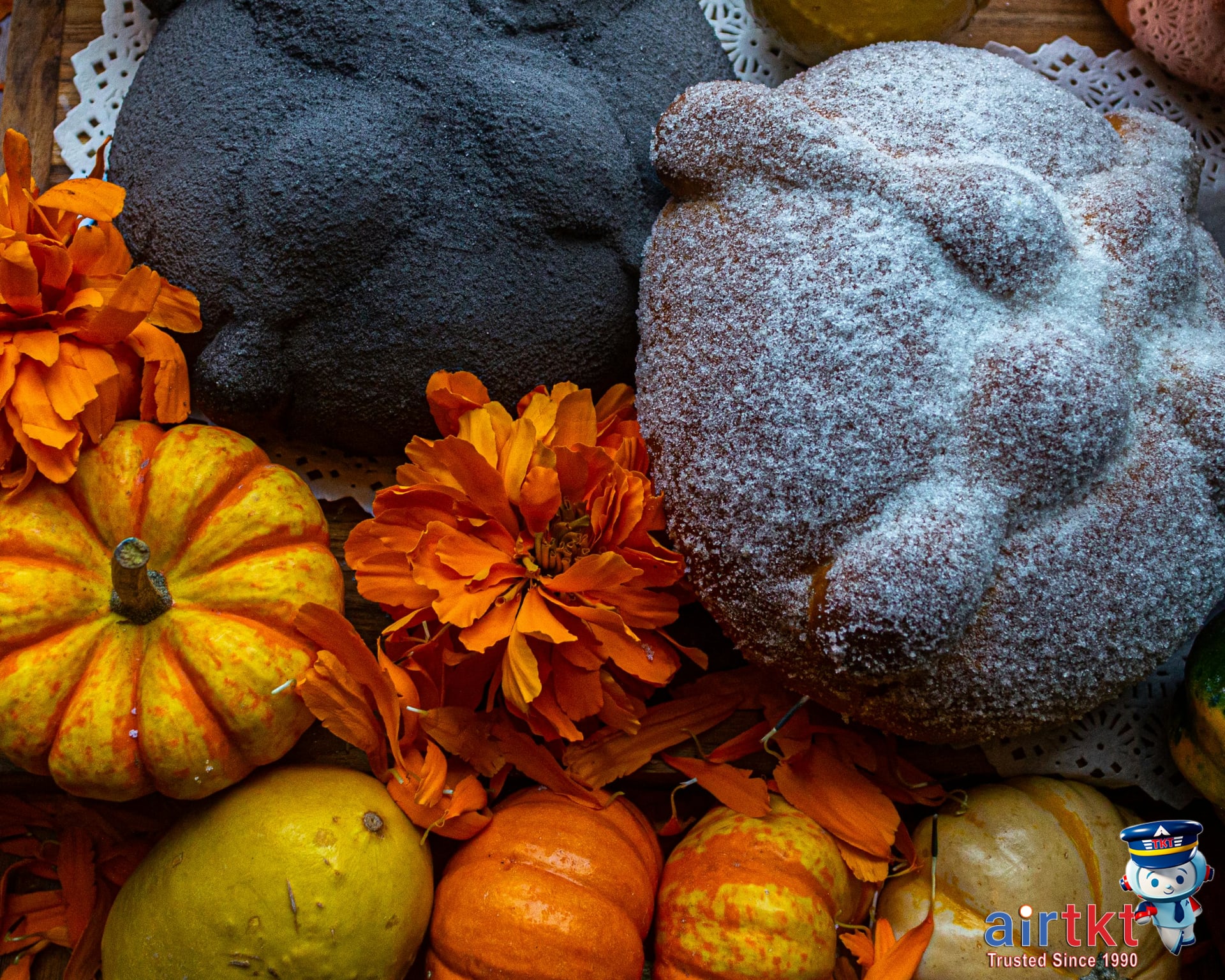 Traditional Mexican pan de muerto and food served for Day of the Dead festival