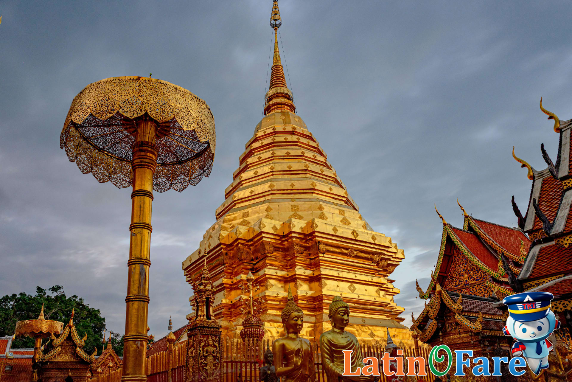 Wat Phra That Doi Suthep in Chiang Mai with golden stupa and sweeping mountain views for temple visitors.
