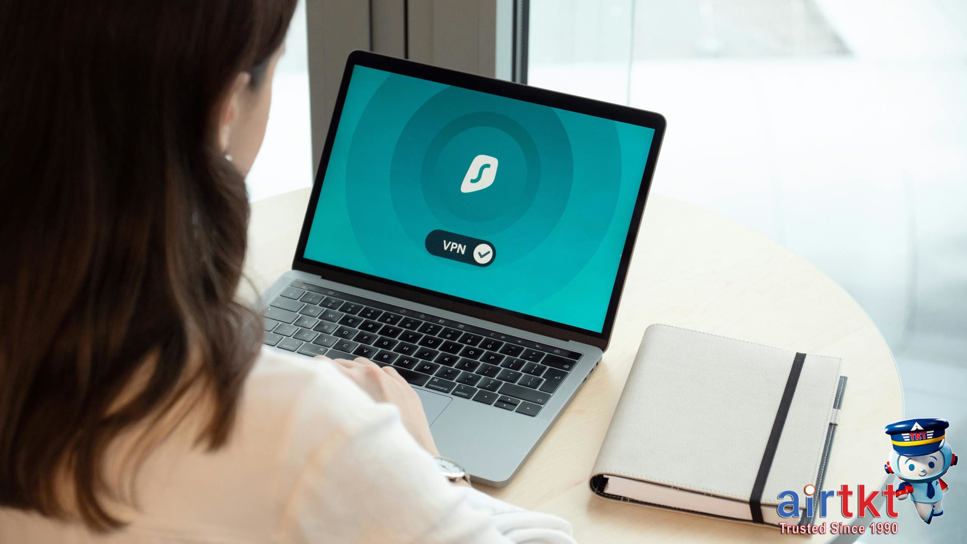 VPN encrypting data flow on laptop screen for enhanced travel security during international travel