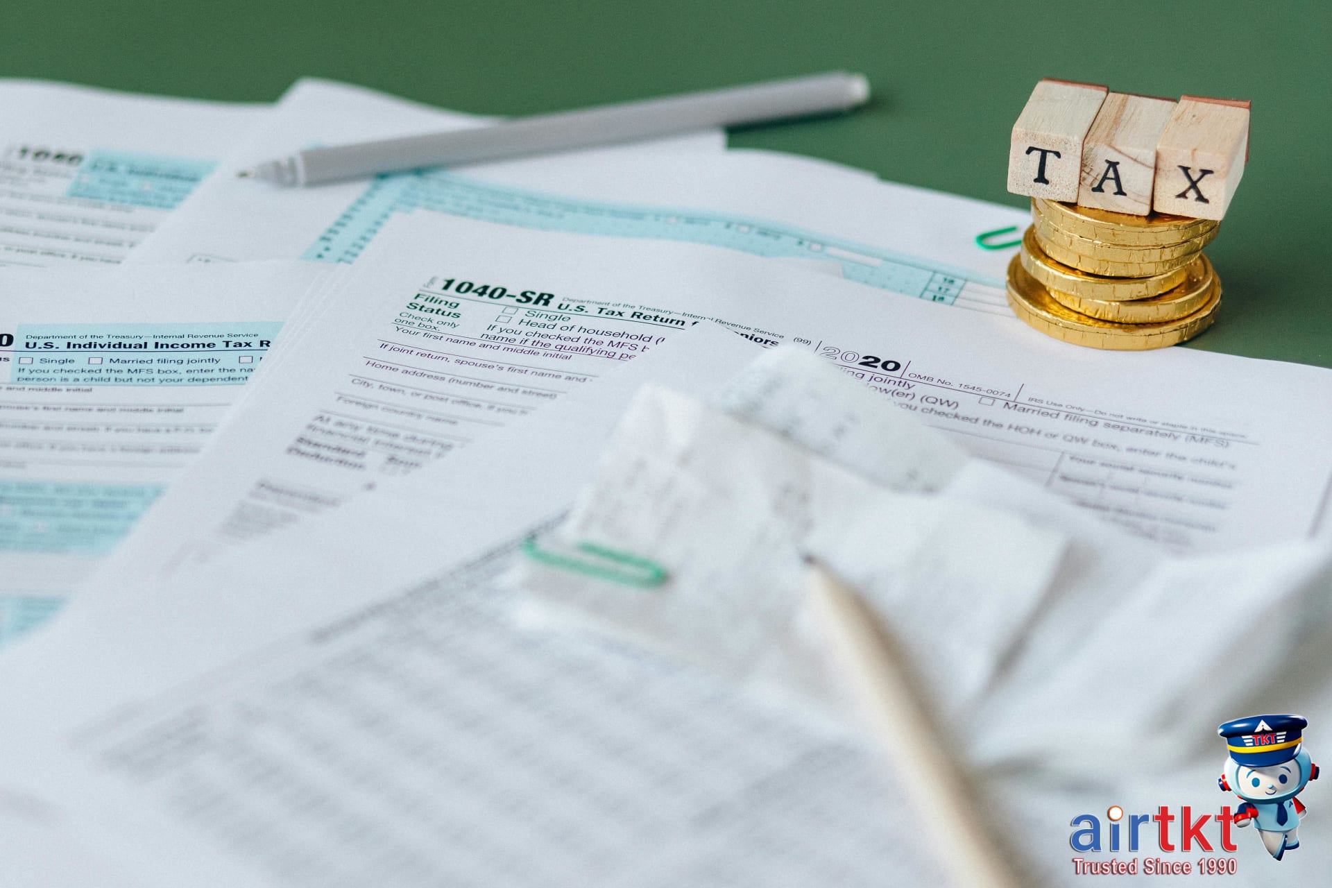 Collection of payment receipts and VAT refund forms laid out on table
