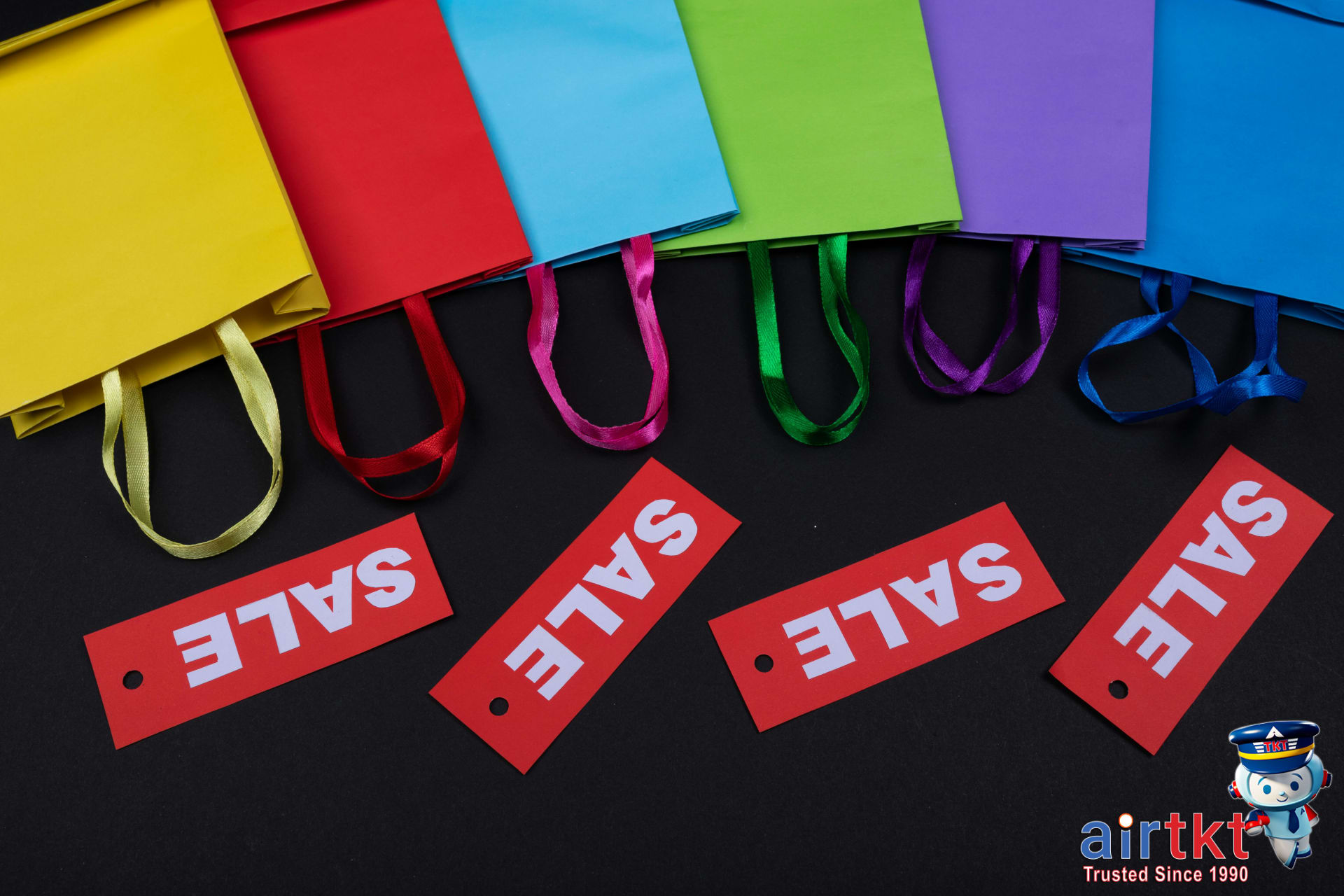 Shopping bags with VAT receipts and price tags on display for VAT refund budget planning
