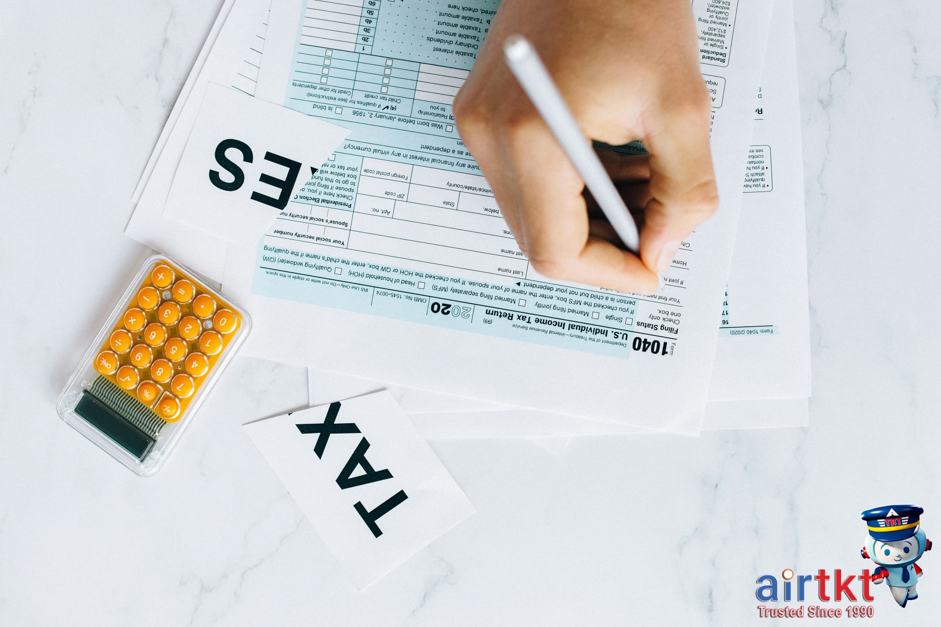 Traveler filling out VAT refund form at shop counter with pen