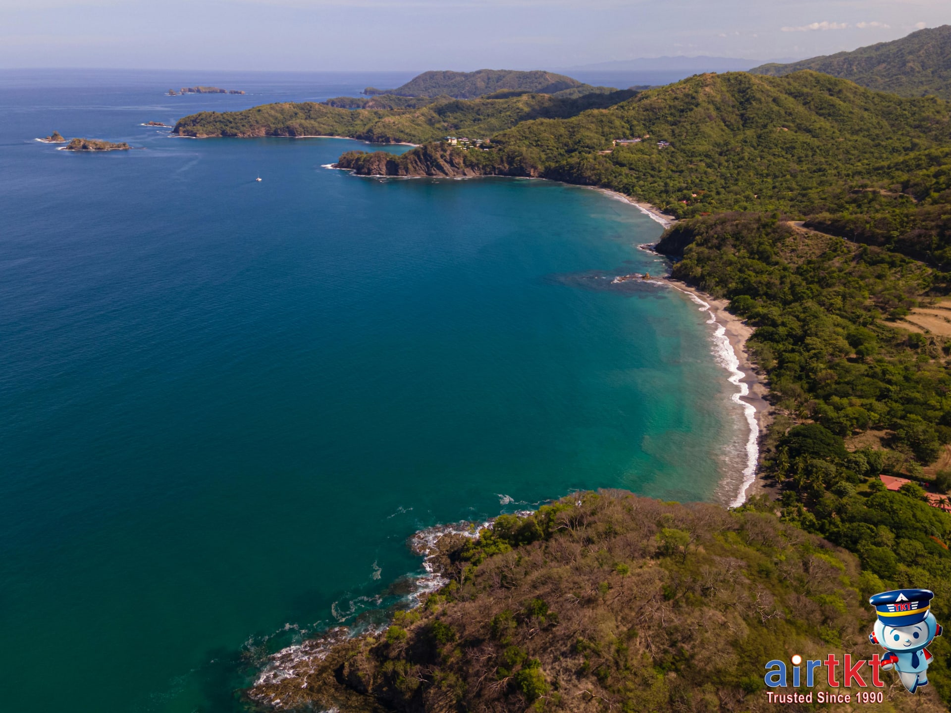 Costa Rica travel deals sign promoting green season savings and discounts for airfare and accommodation