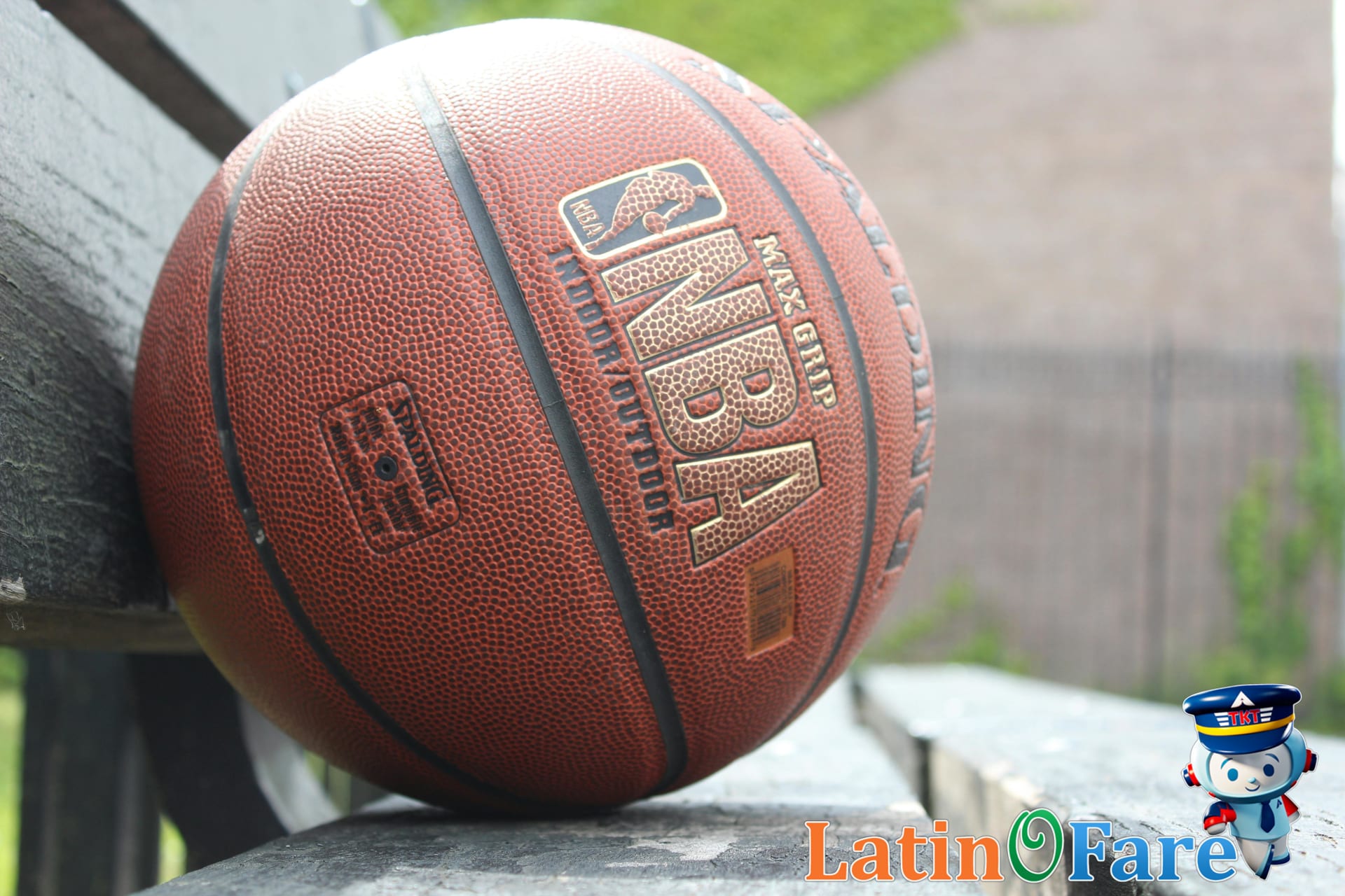 Official NBA Finals tickets held by fans in line before entering arena gates