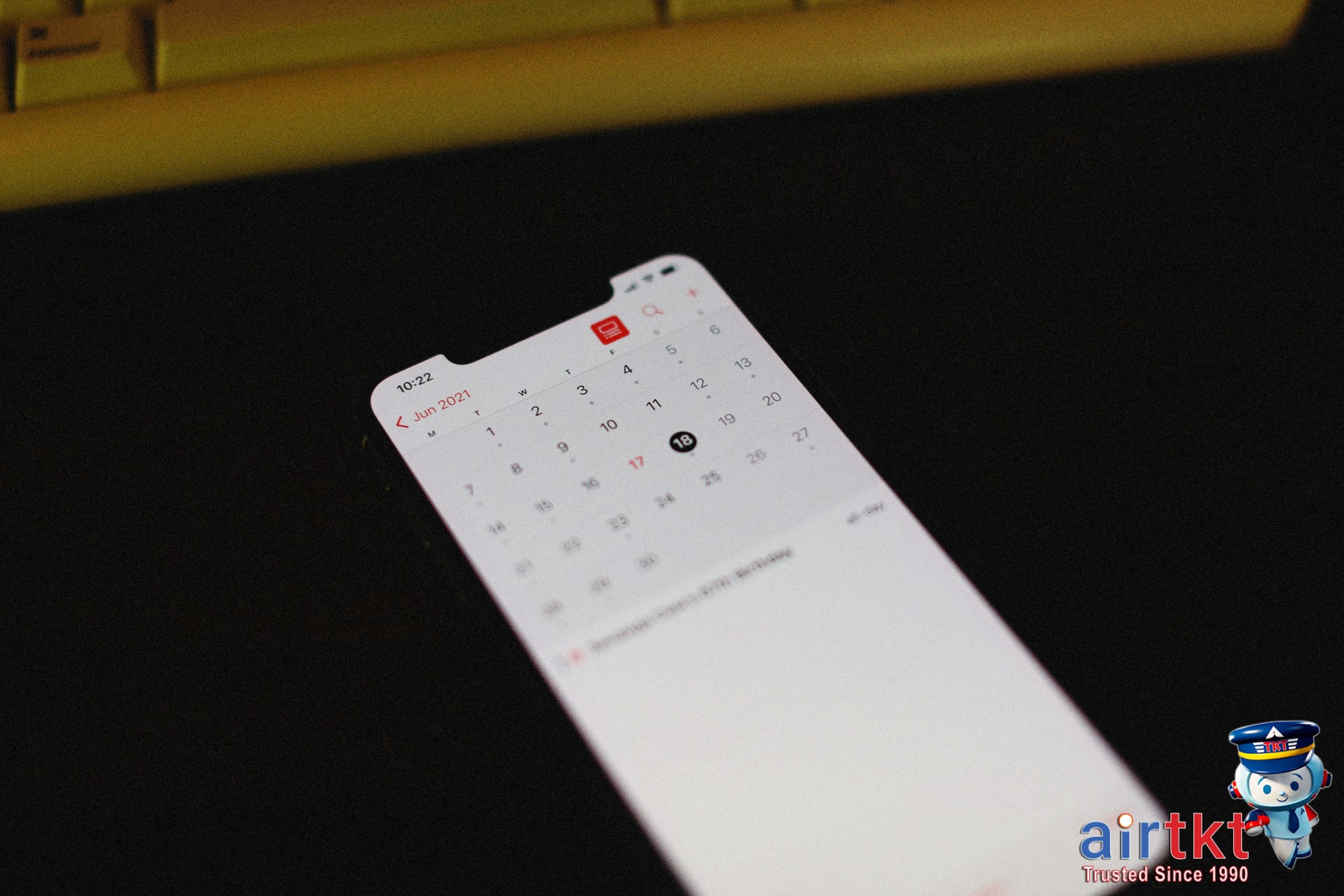 Smartphone screen displaying a digital calendar for flexible travel dates