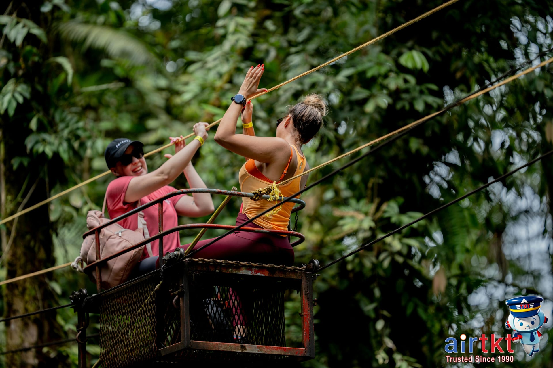 Zip-line platforms in dense Costa Rica rainforest canopy for adventure