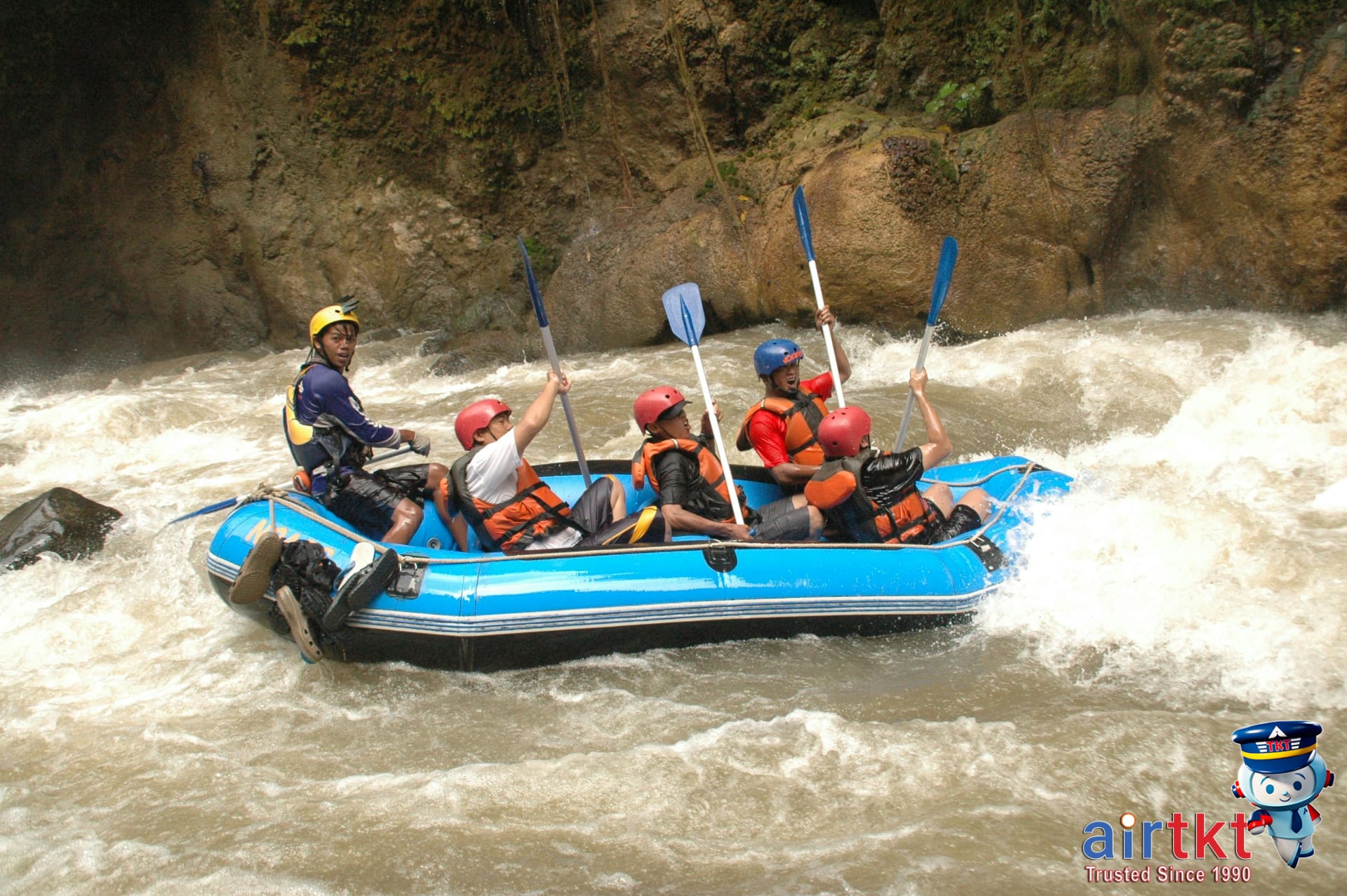Group enjoying exhilarating whitewater rafting adventure through Costa Rica rapids