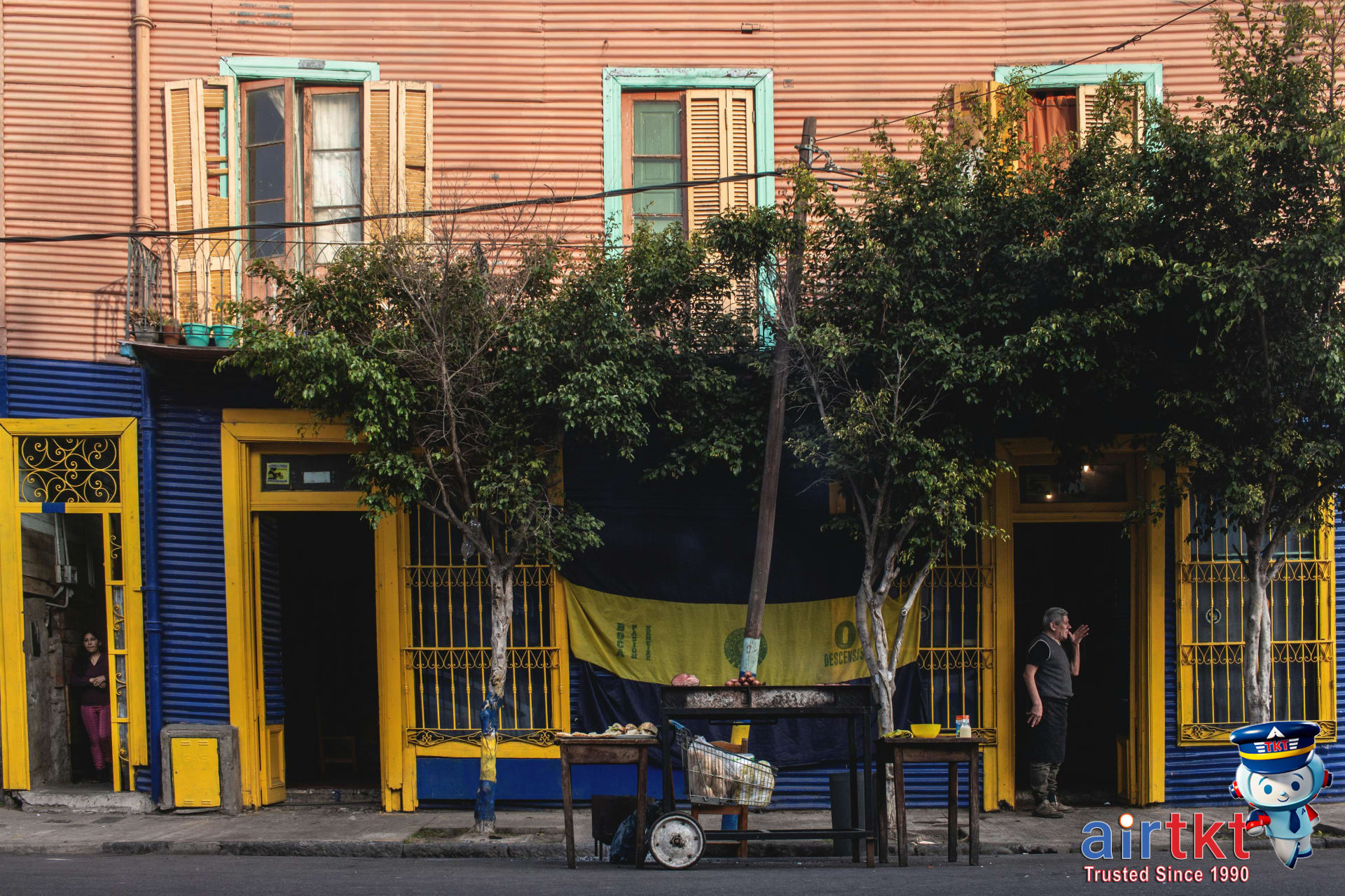 Colorful La Boca street in Buenos Aires showcasing vibrant architecture and local life