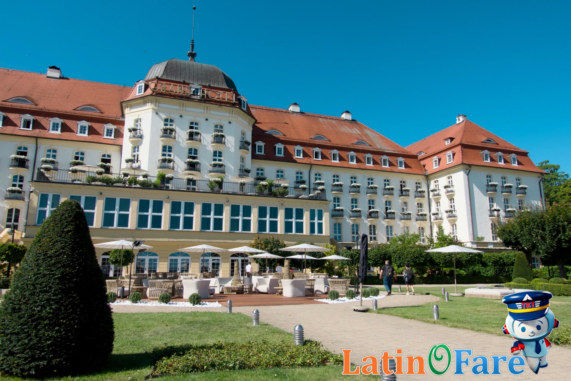 Elegant hotel terrace in Europe booked as part of a summer package using travel booking platforms for deals
