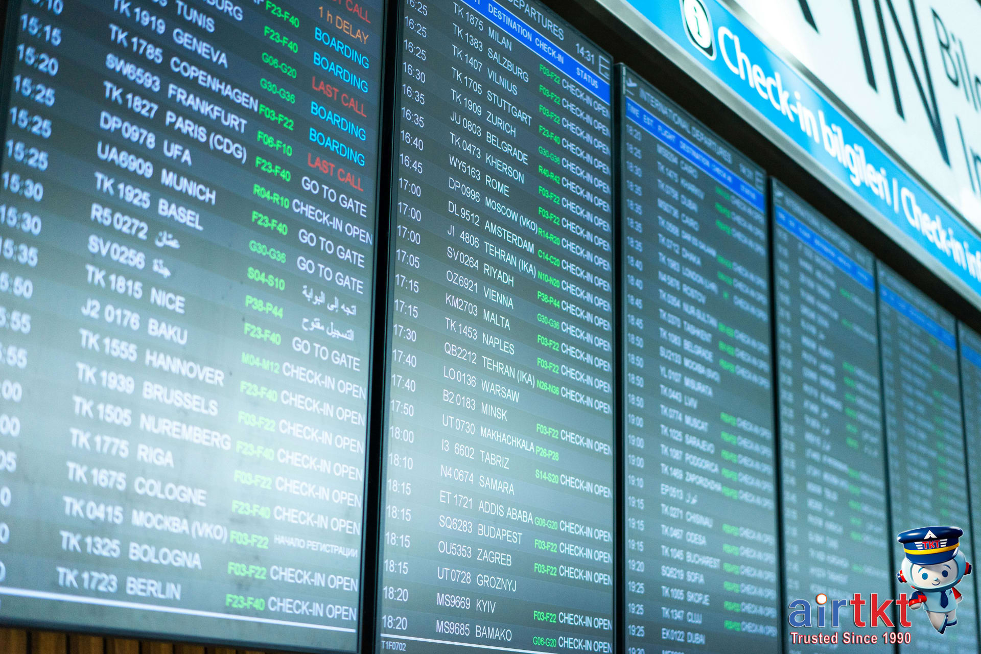 Airport departure board showing various flight price changes and times