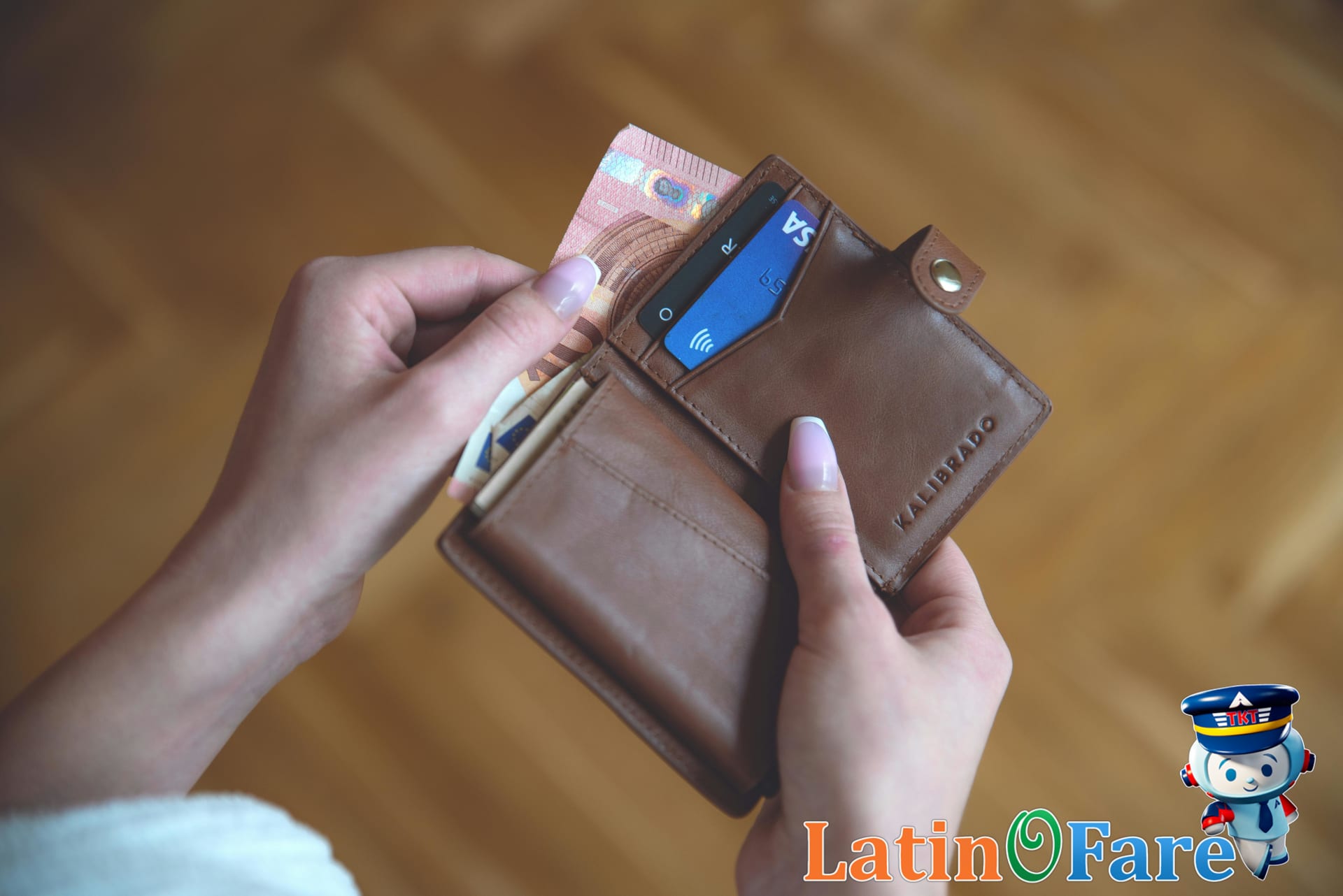 Close-up of hands holding a wallet in a crowd, emphasizing common pickpocket targets for travelers.