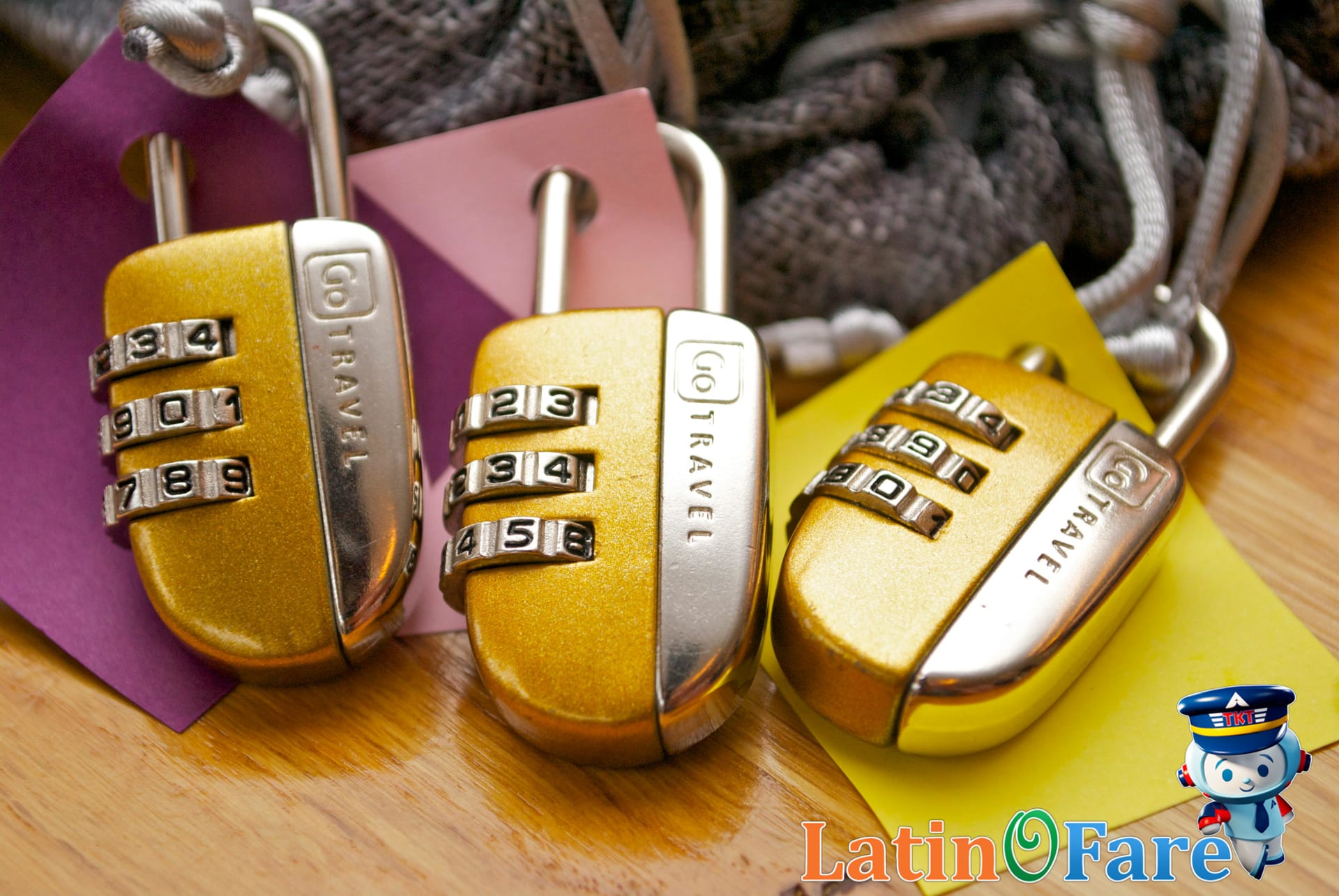 Three gold combination padlocks highlighting tips for hotel room security FAQs.