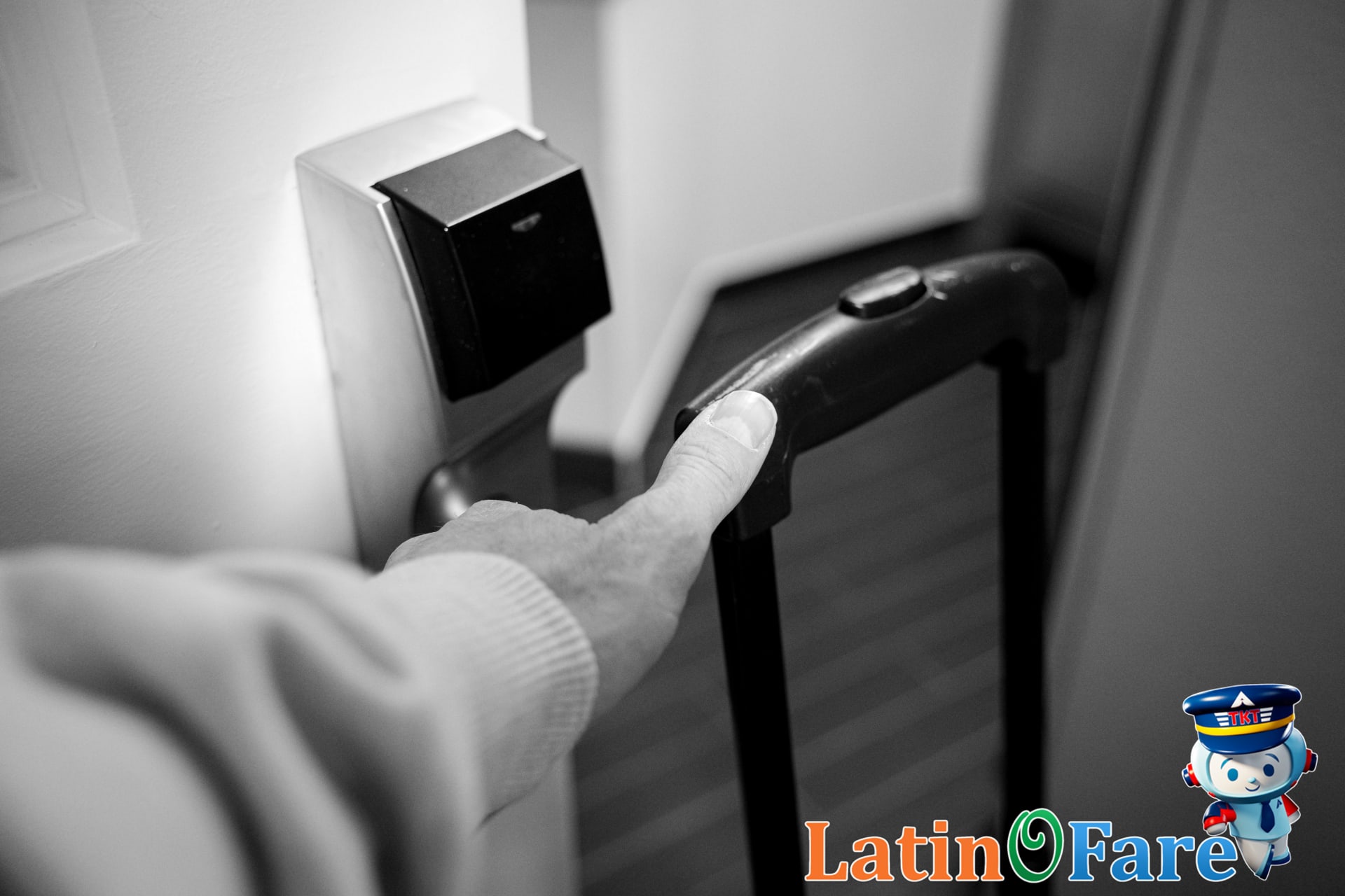 Traveler locks hotel door and secures bags for hotel room security tips.
