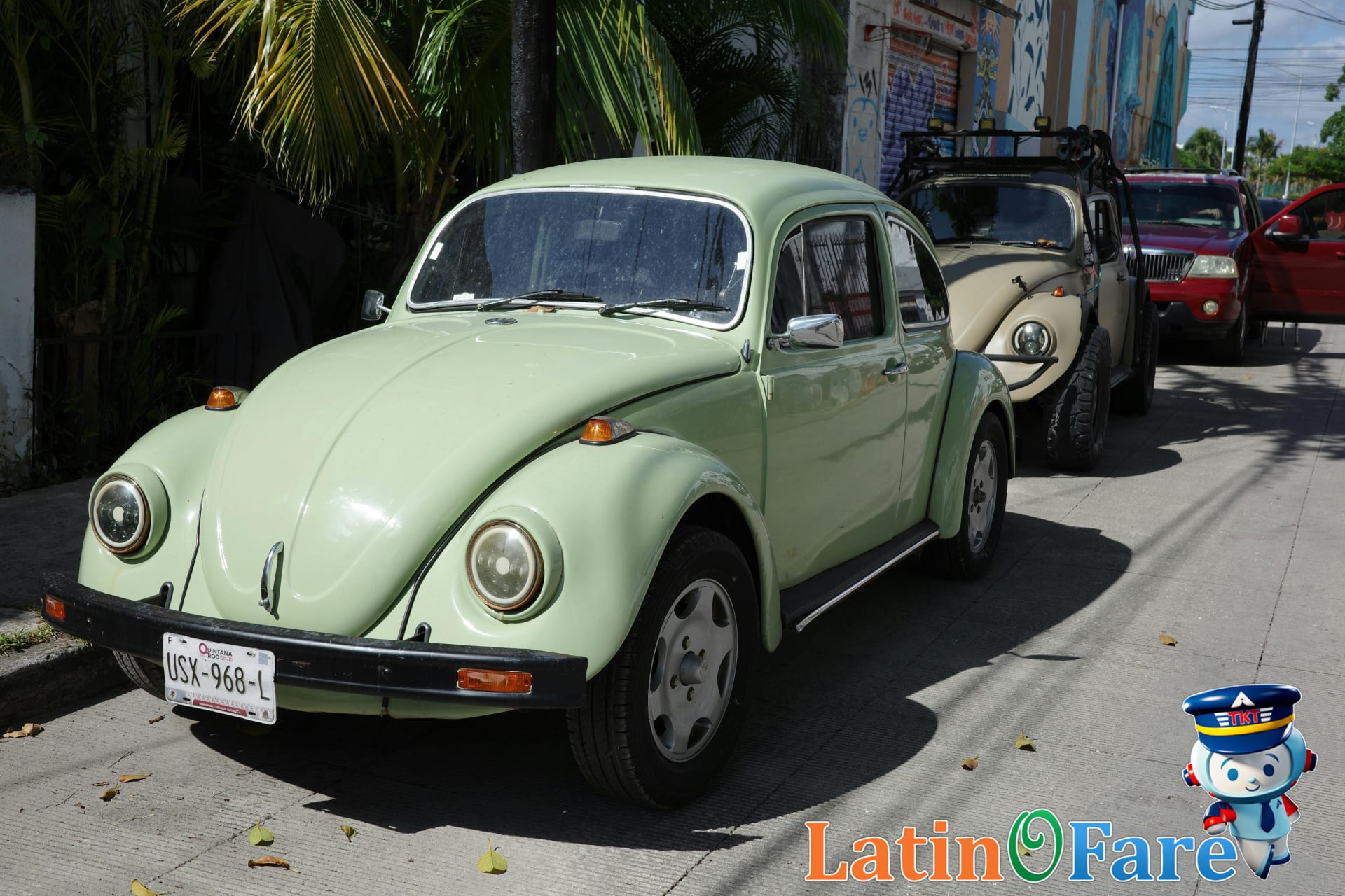Shuttle service and rental cars parked outside Cancun hotels, illustrating how tourists get around.