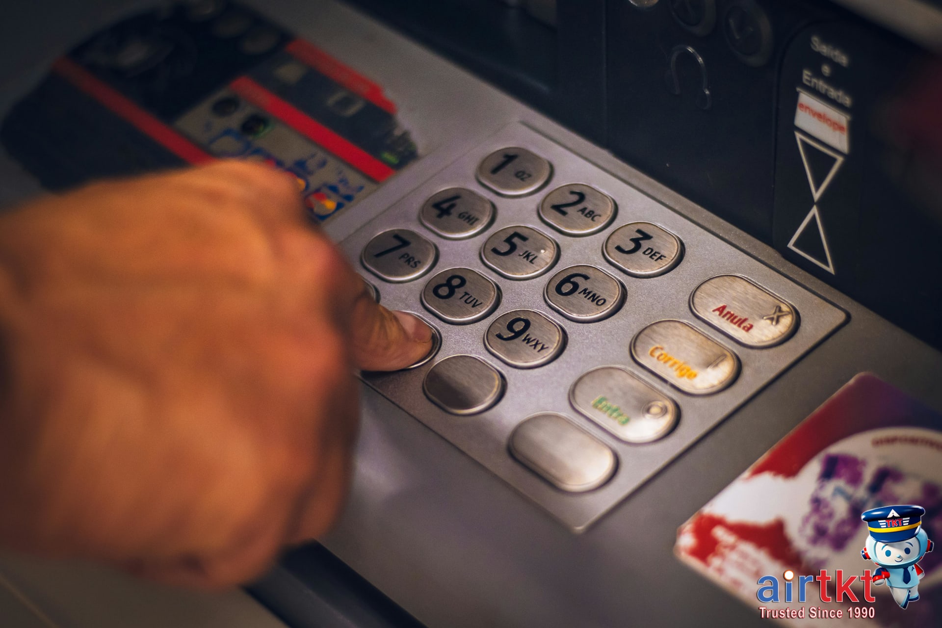 Traveler choosing safe ATM inside busy well-lit bank lobby for safety