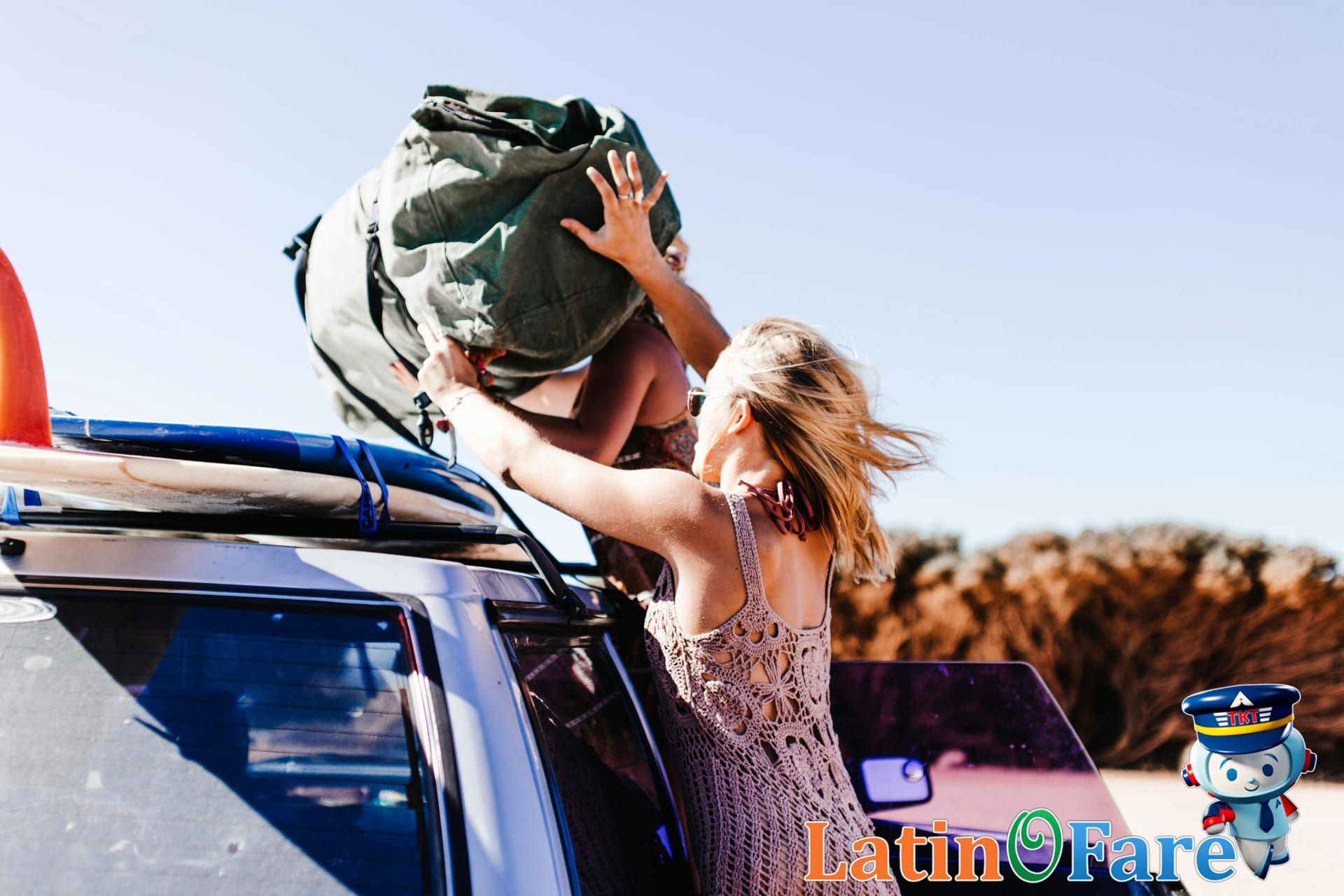 Family preparing for Labor Day travel, loading suitcases for a summer road trip