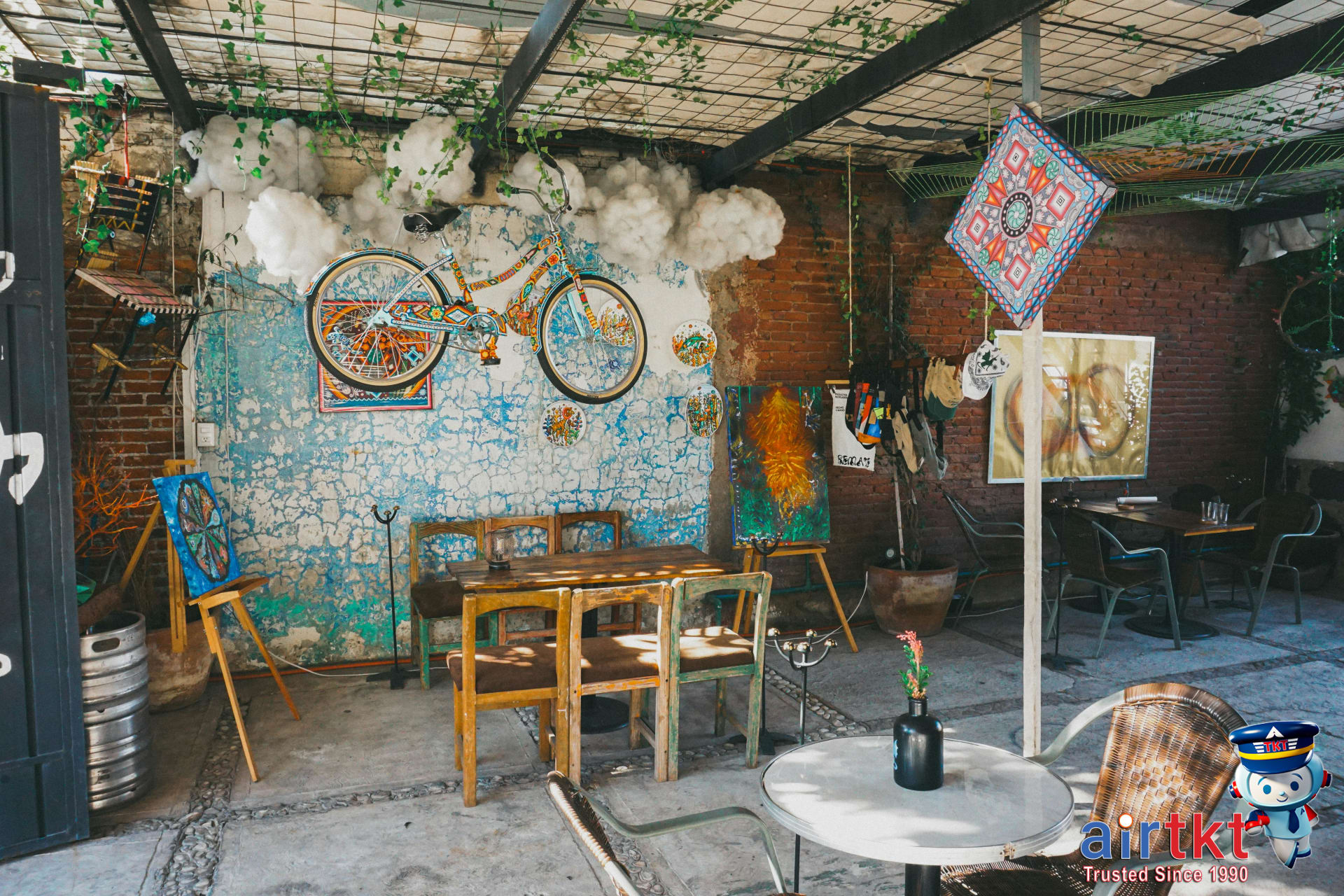 Colorful streets lined with outdoor cafes and greenery in Condesa neighborhood Mexico City