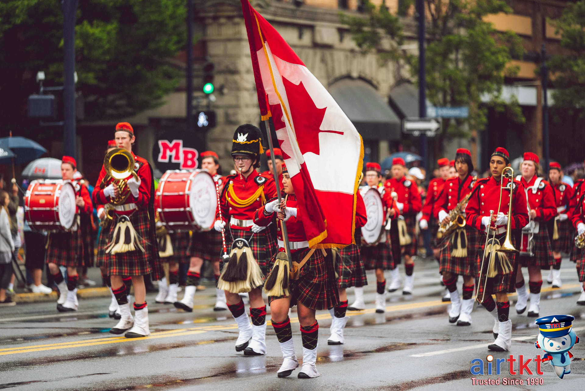 Labour Day parade and celebrations in Canada with families and flags