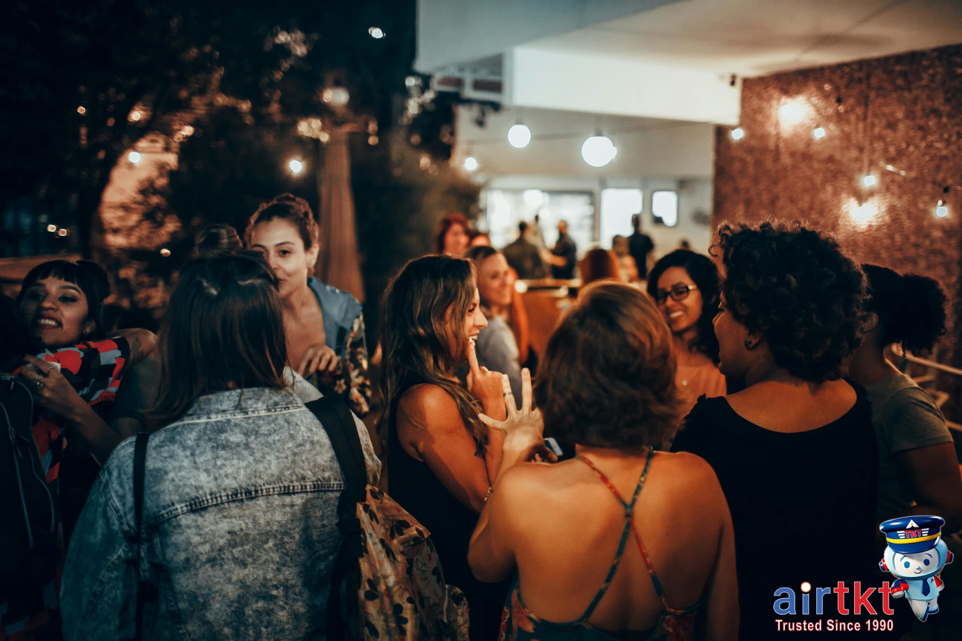 SXSW festival party with attendees networking and socializing outdoors