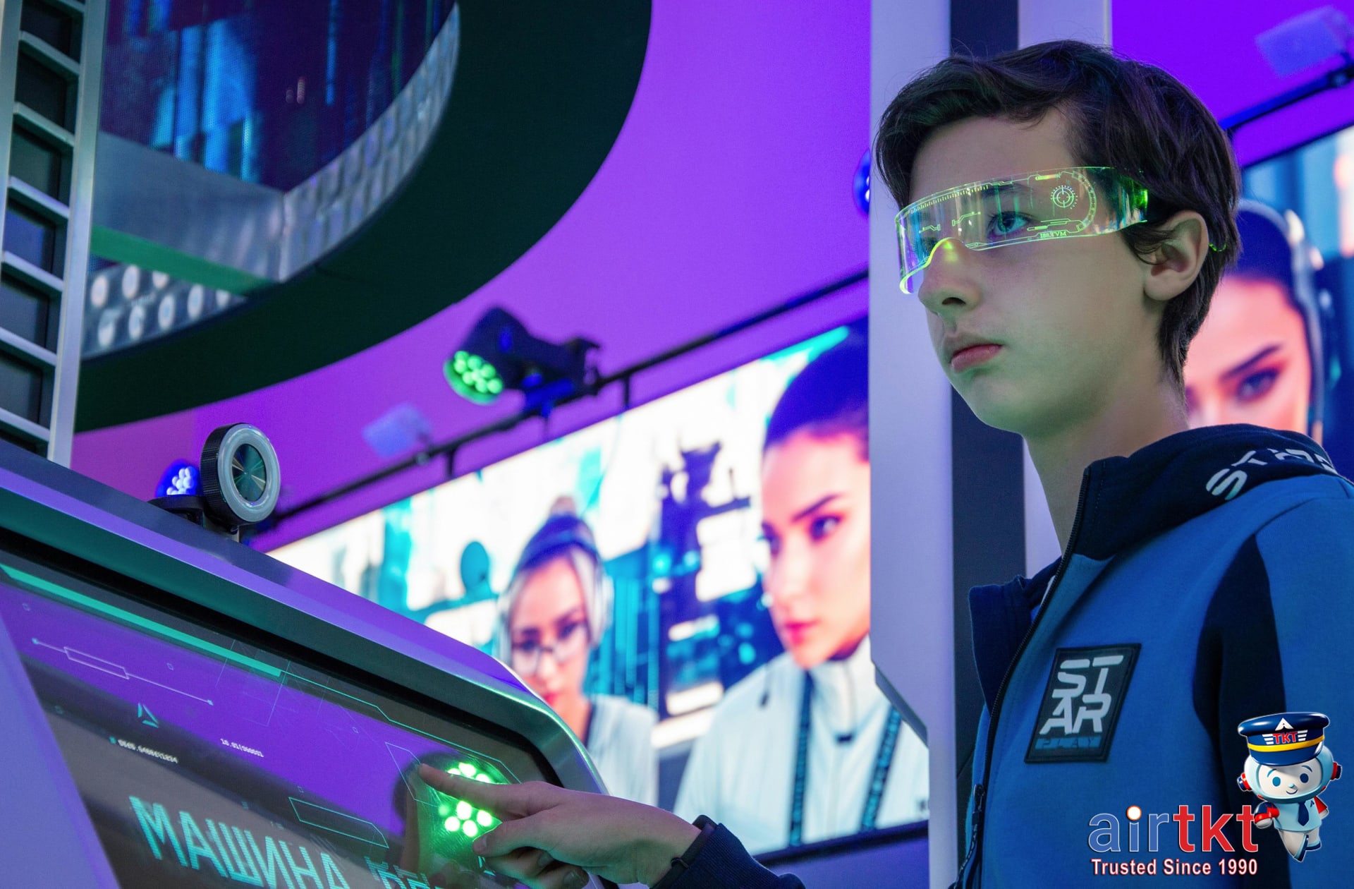 Interactive tech exhibit with teenager using touchscreen at SXSW