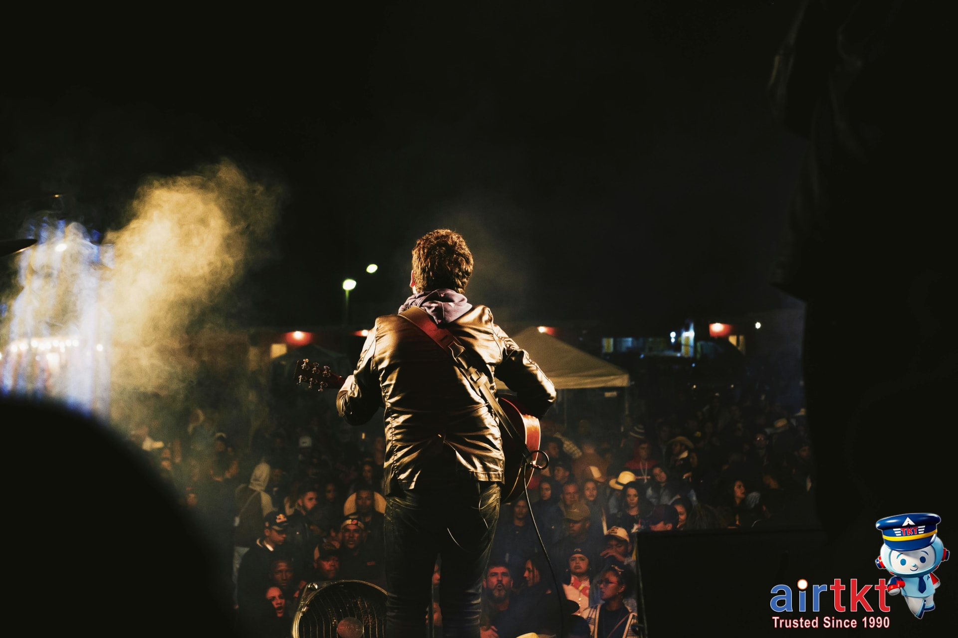 Live music performance on stage at SXSW Austin festival with crowd