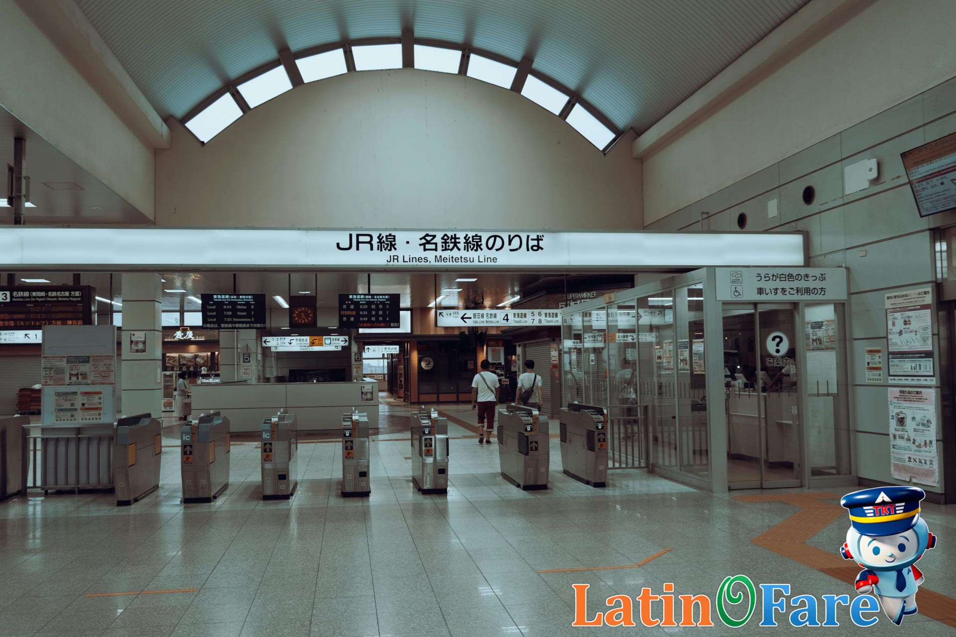 Japan Rail Pass exchange office sign at a major train station in Japan