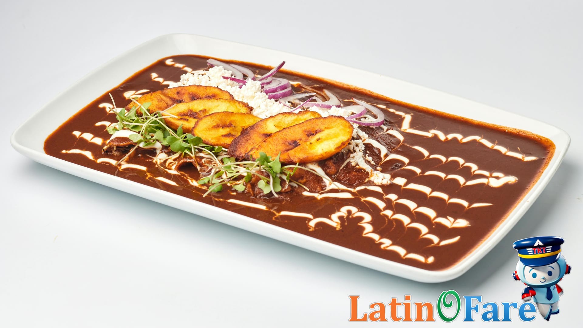 Authentic mole poblano dish and tequila enjoyed in Puebla during Cinco de Mayo food experience.