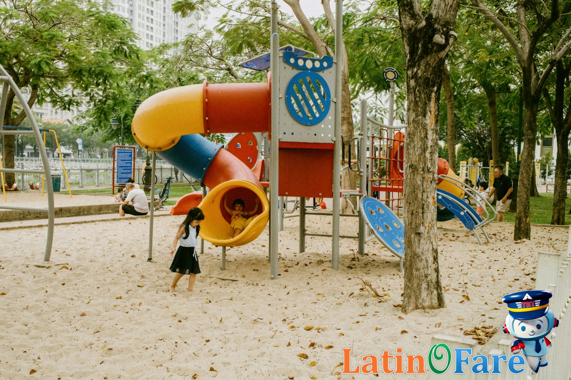 Children enjoying playground and park activities during family travel for fun, affordable outings.