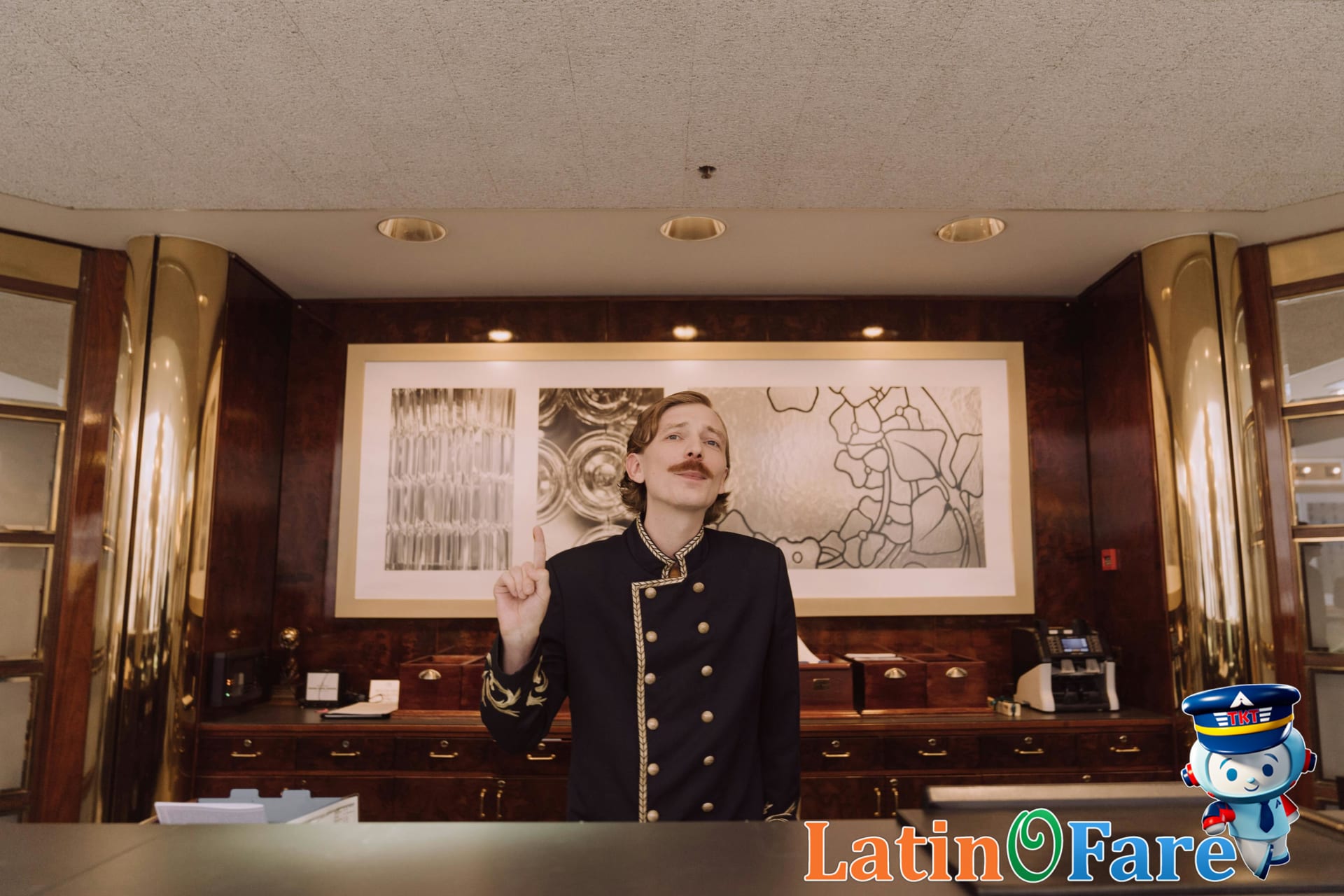 Hotel front desk staff handing loyalty rewards card to guest, illustrating hotel loyalty point process