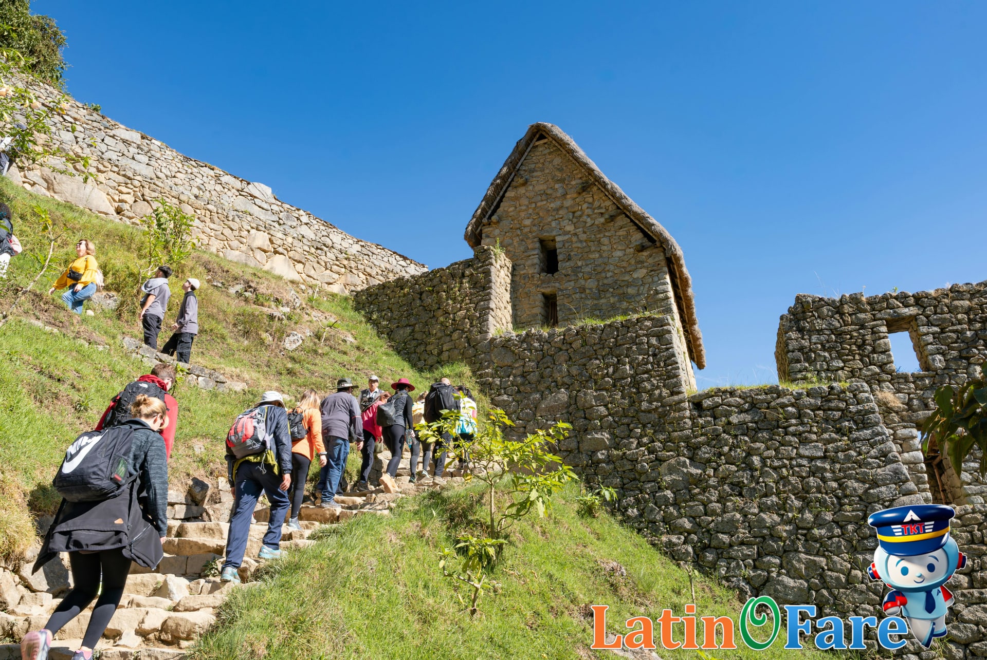 Tourists respectfully exploring Machu Picchu ruins practicing responsible travel and sustainable tourism conduct