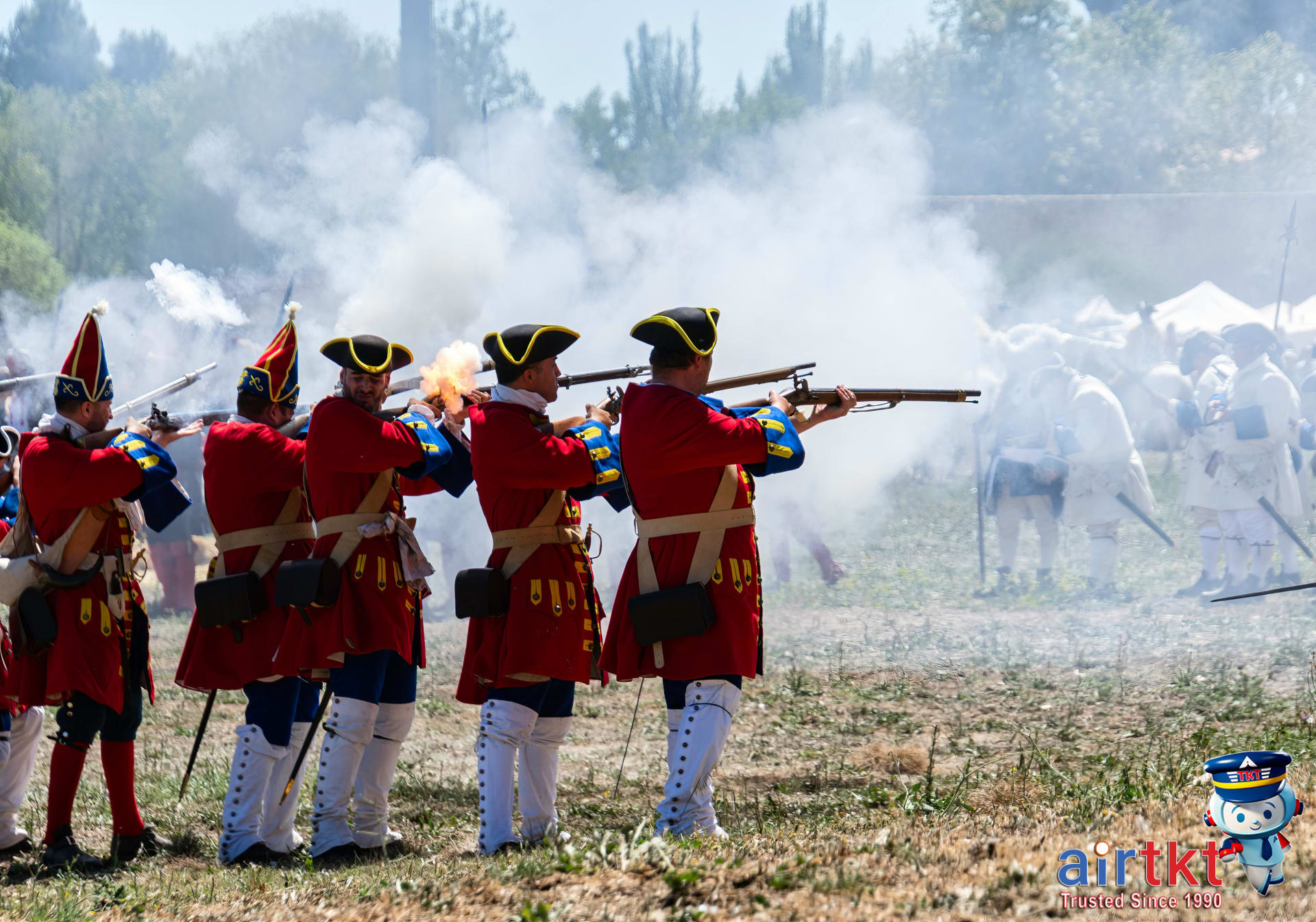 Reenactment of Battle of Puebla with actors firing muskets in period costumes