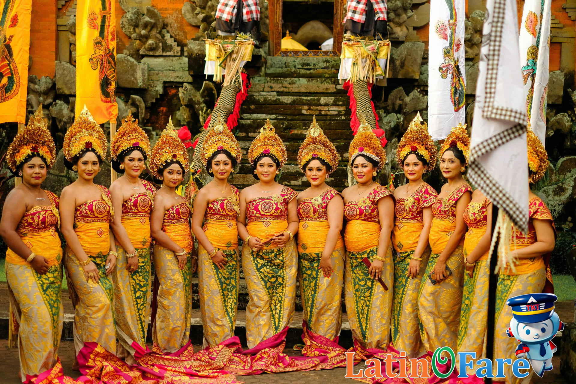 Travelers participating in a cultural tour experience at a Bali temple for their first visit