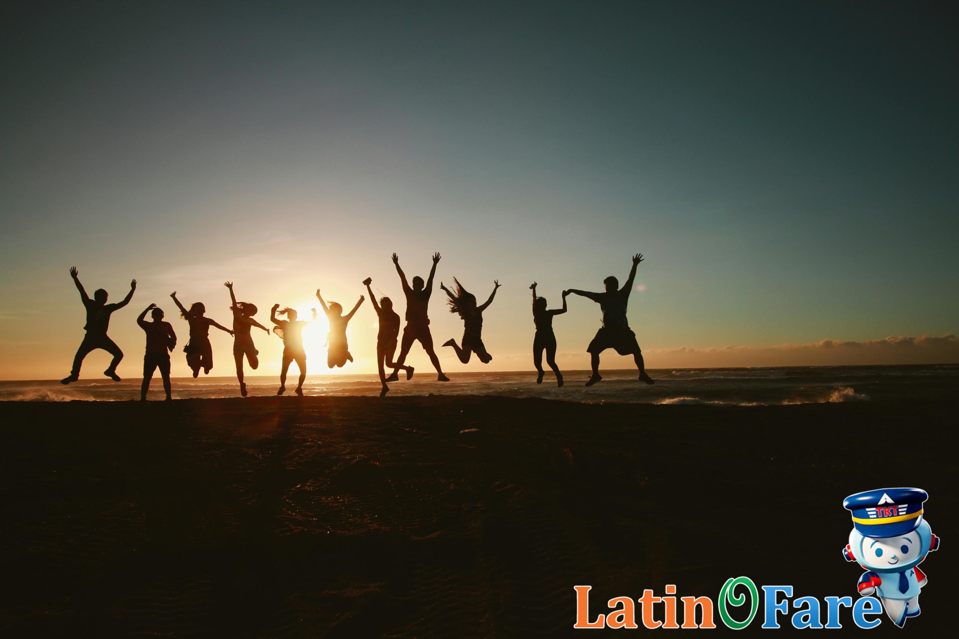 Group of friends enjoying sunset, celebrating the start of summer June vacation adventure together.