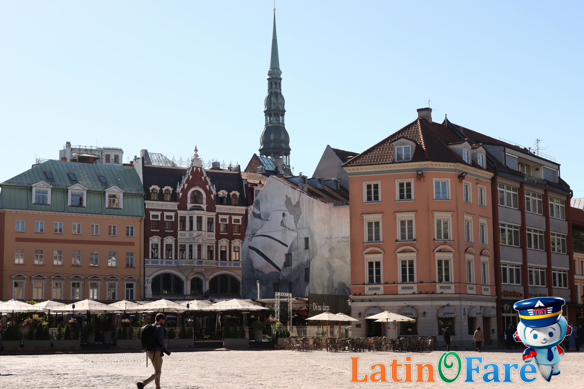 June travelers exploring vibrant European plaza under blue skies, top international destination for summer.