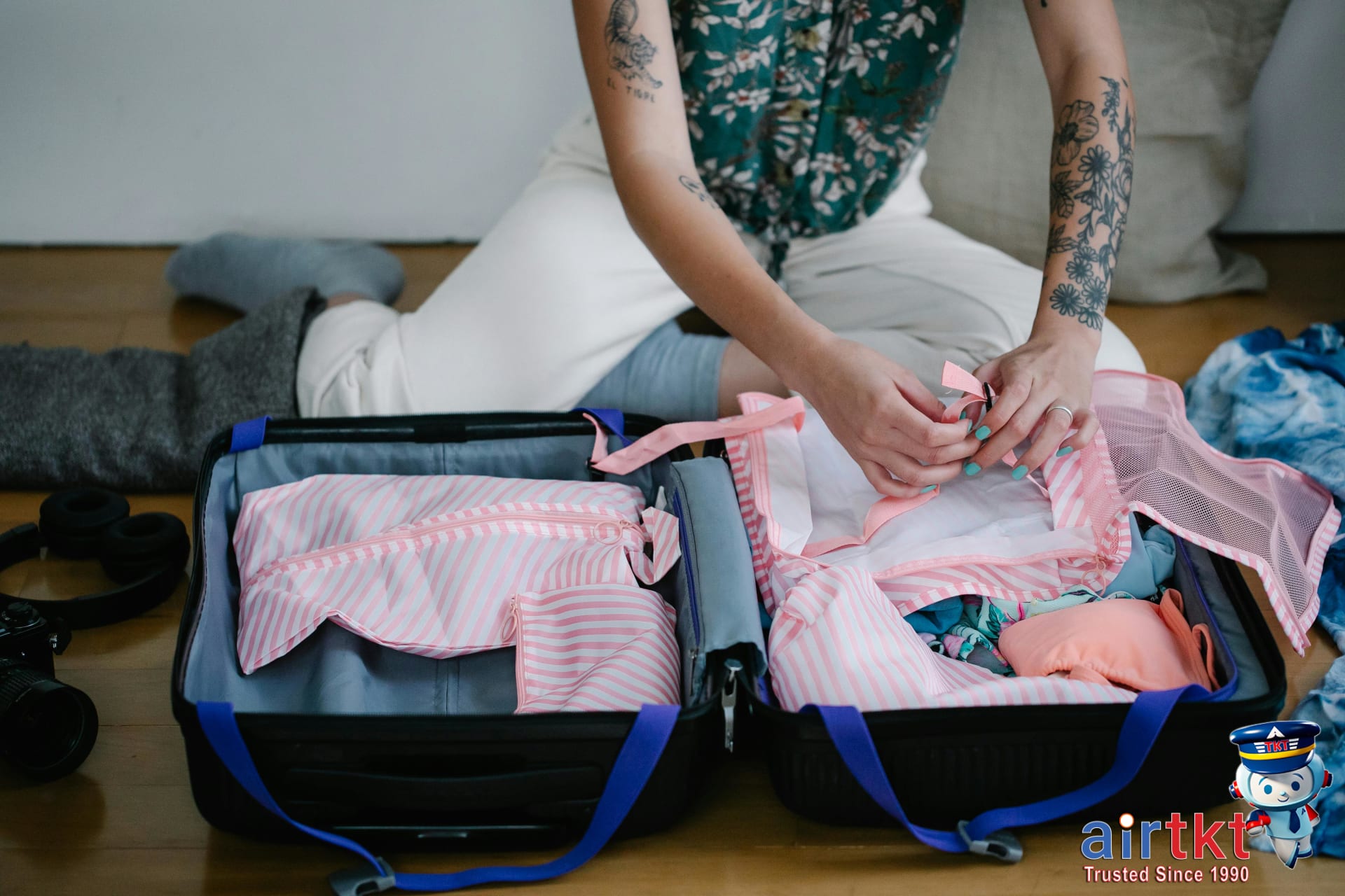 Lightweight travel clothing for packing light on a bed layout