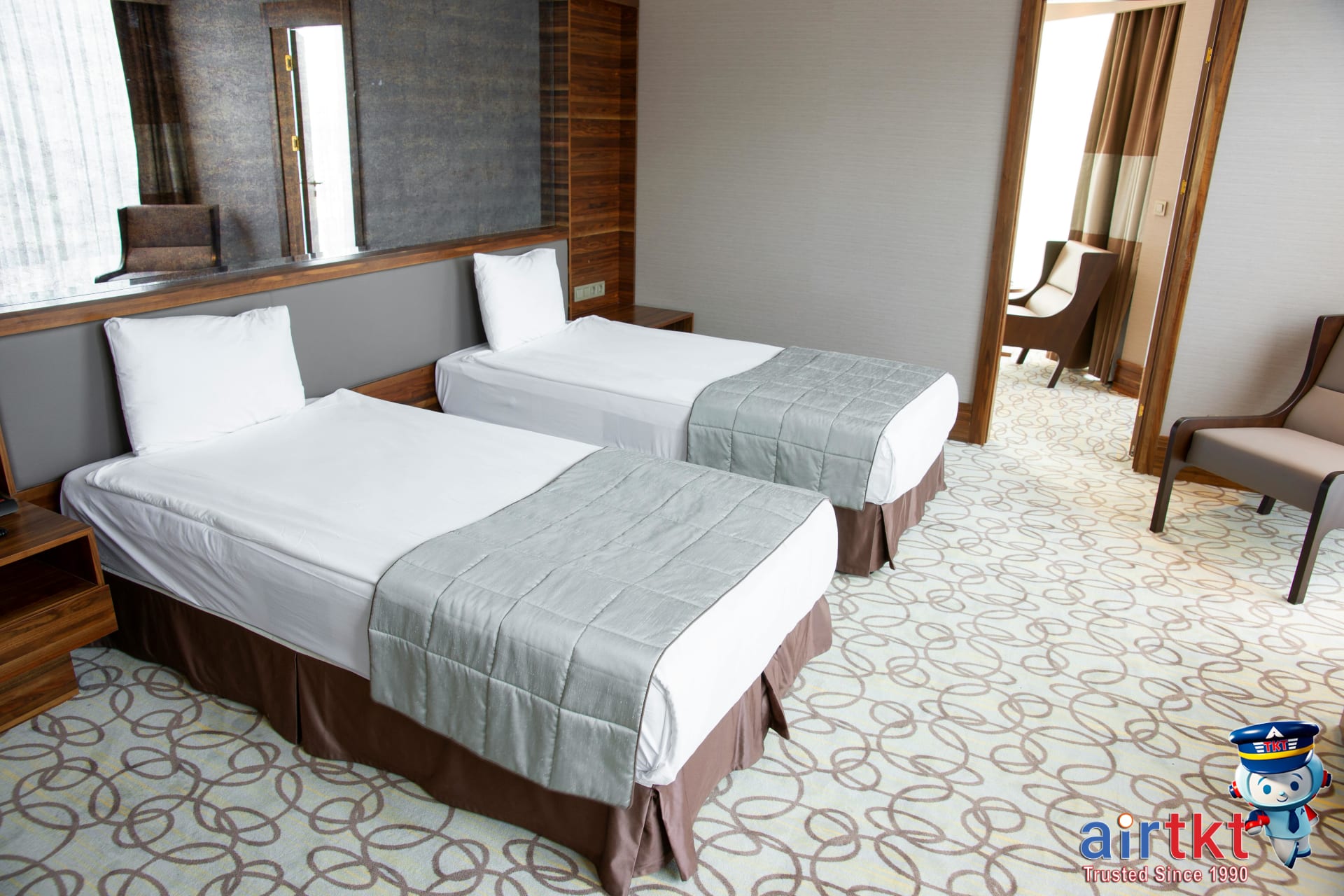 Comparison of budget and luxury hotel rooms showing comfortable beds and decor
