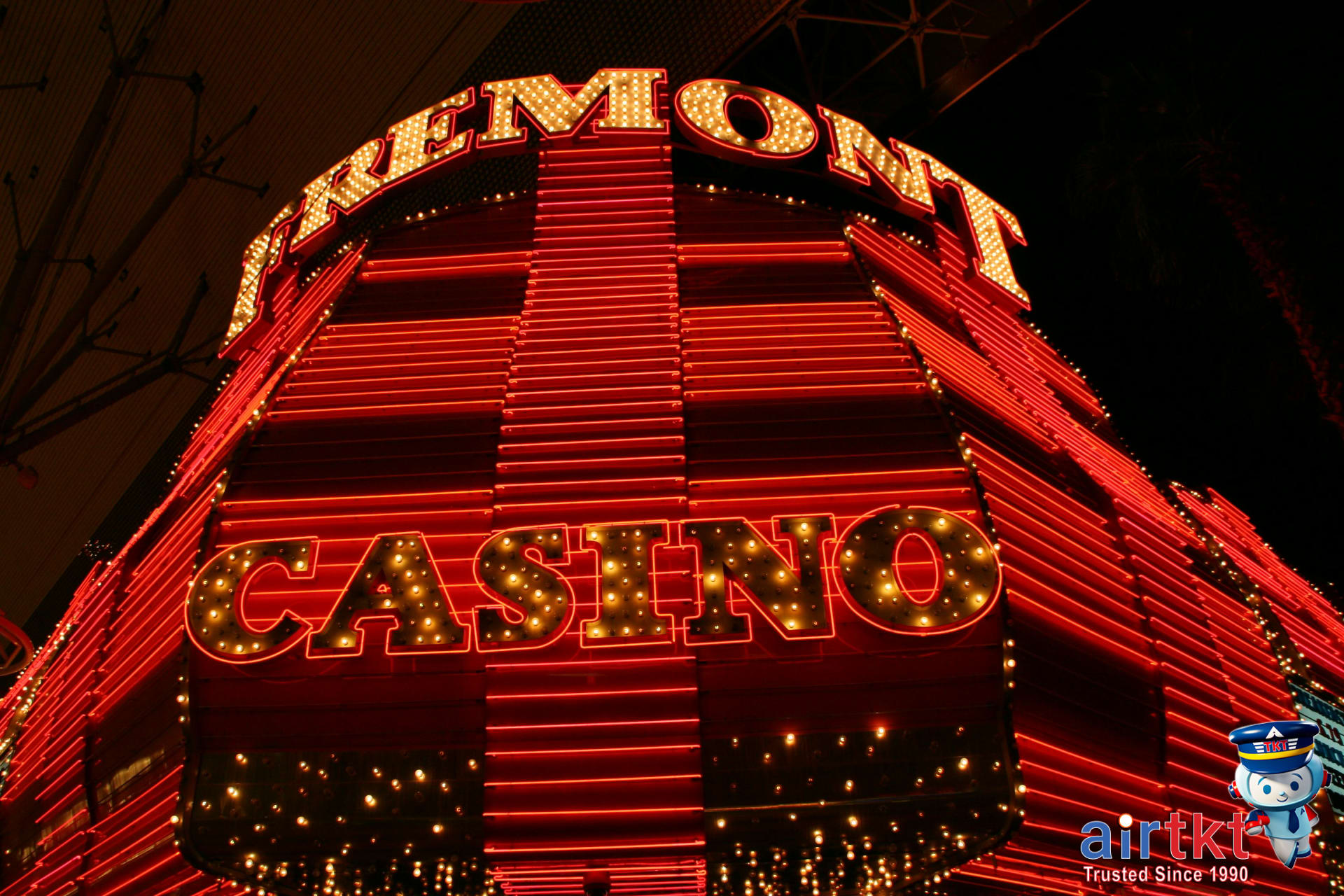 Fremont Street vibrant nightlife with neon lights and crowds in Las Vegas