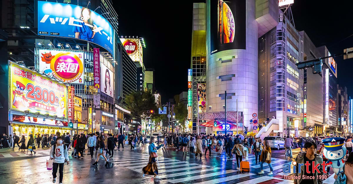 Tokyo Shibuya Crossing vibrant neighborhood bustling with people and lights