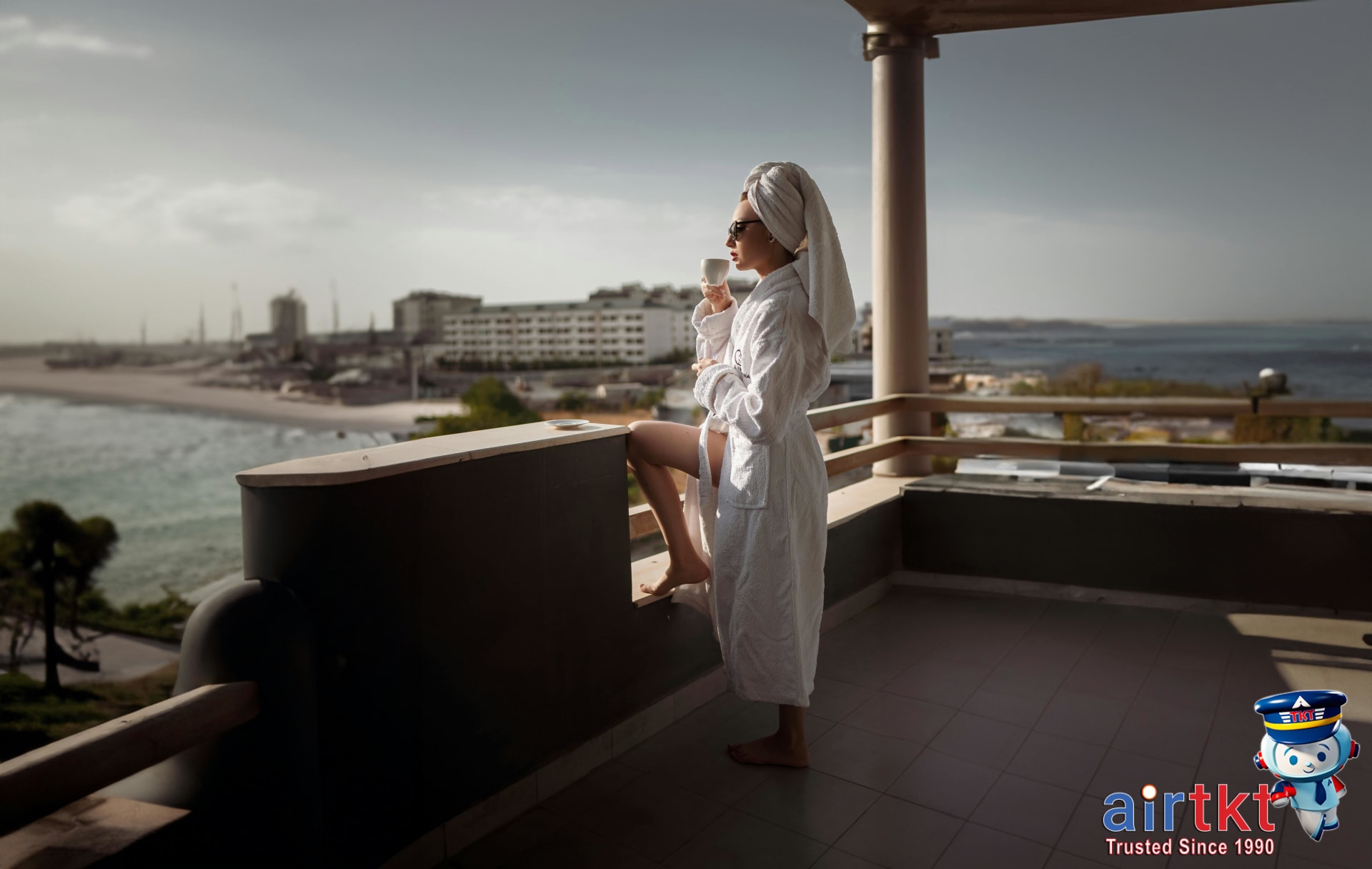 Relaxing hotel balcony with sunset view on Mother's Day getaway with woman