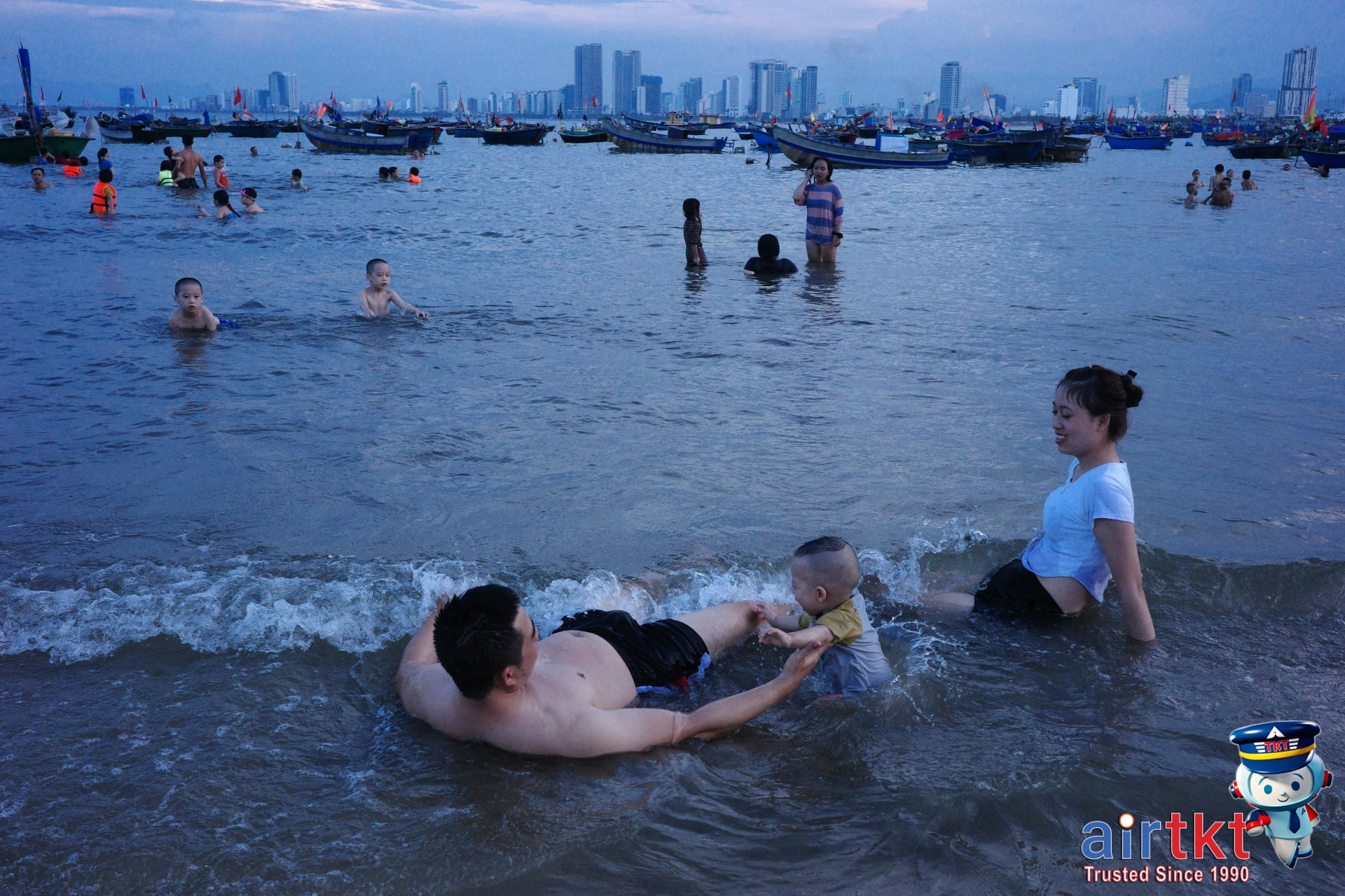 Family enjoying relaxed vacation in scenic cityscape with skyline views