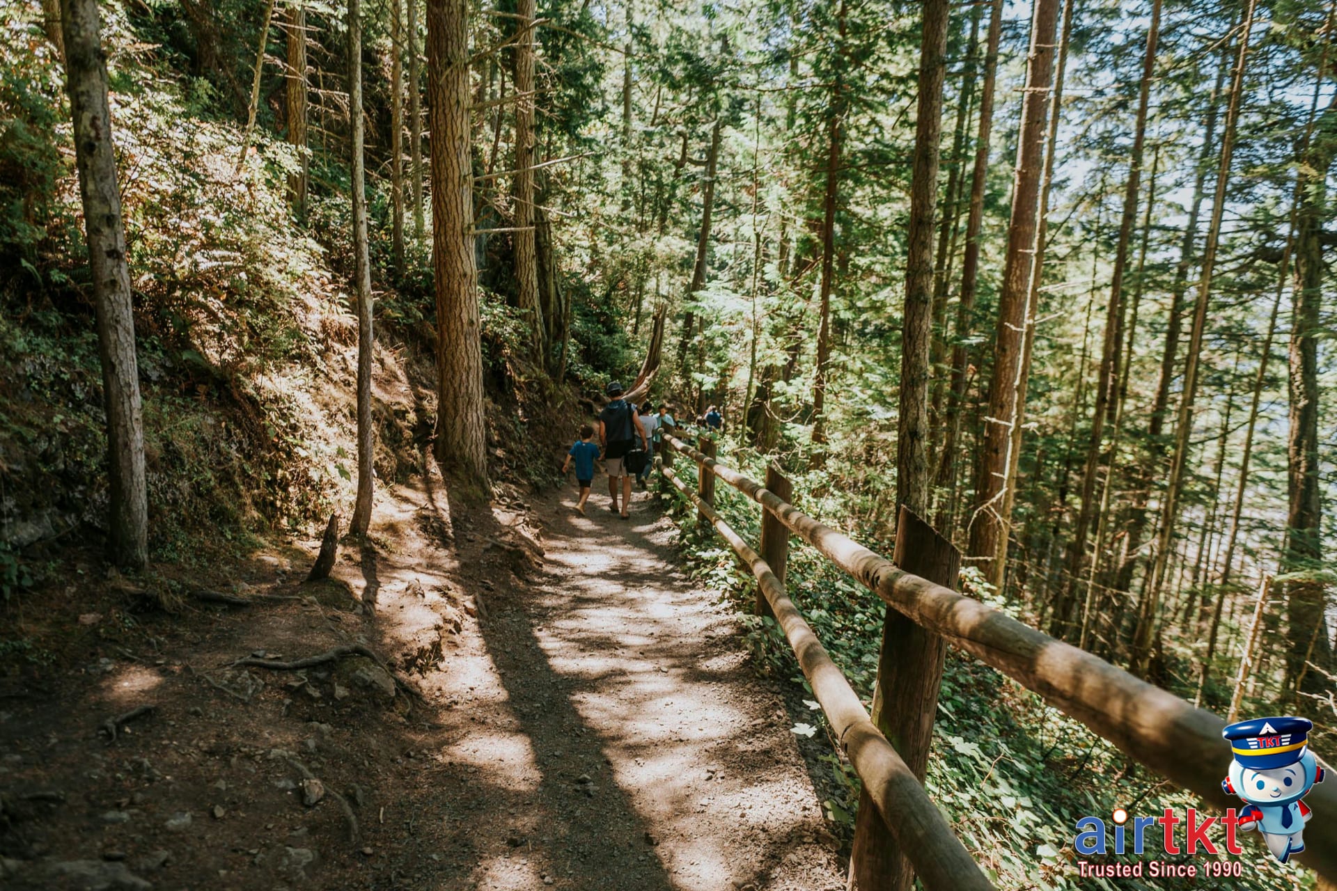 Family hiking easy trail in nature park enjoying outdoor adventure