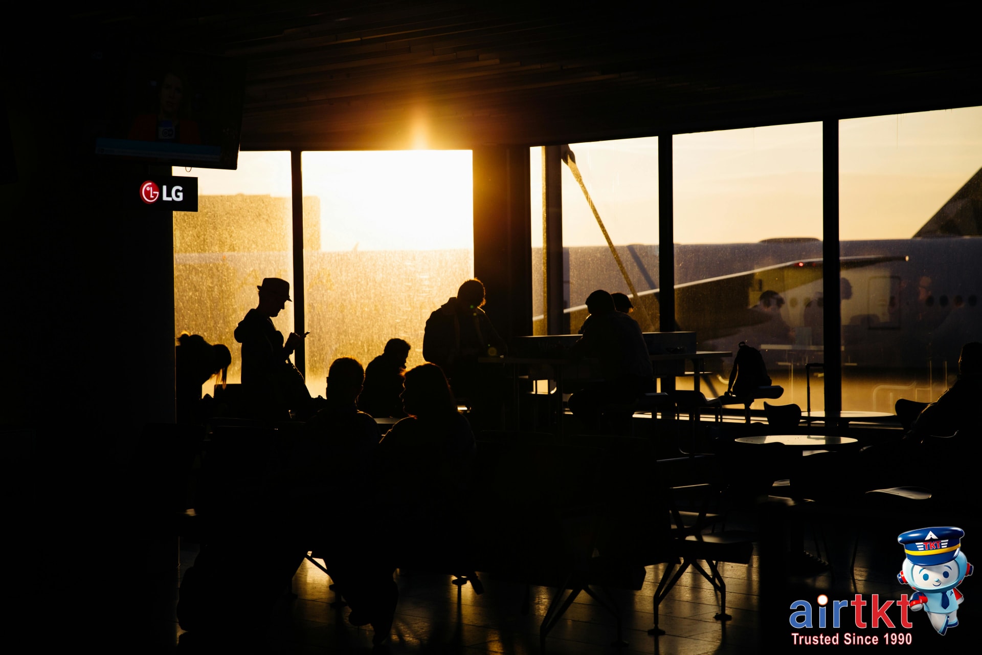 Crowded holiday season airport with travelers showing fare price volatility